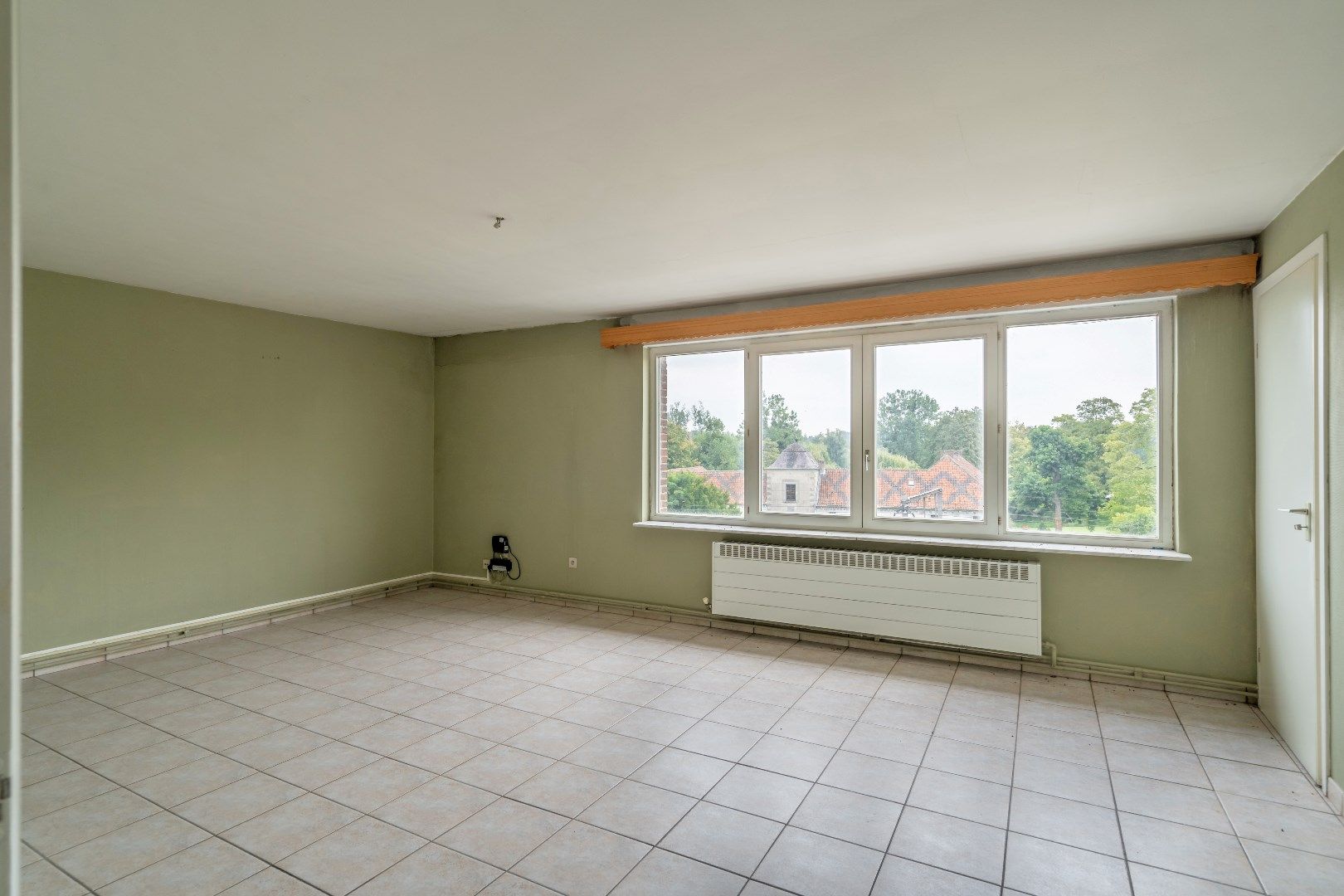 Te renoveren appartementsgebouw bestaande uit drie appartementen en een studio, vlakbij het centrum van Hoeselt foto 20