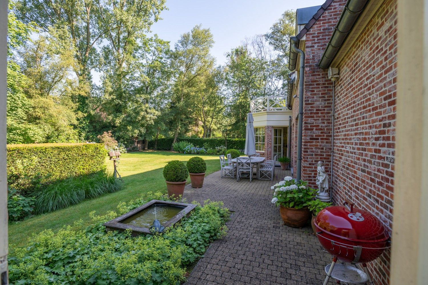 Prachtige tijdloze villa op een aangenaam en zongericht perceel van 2.394 m² te Schilde. foto 42