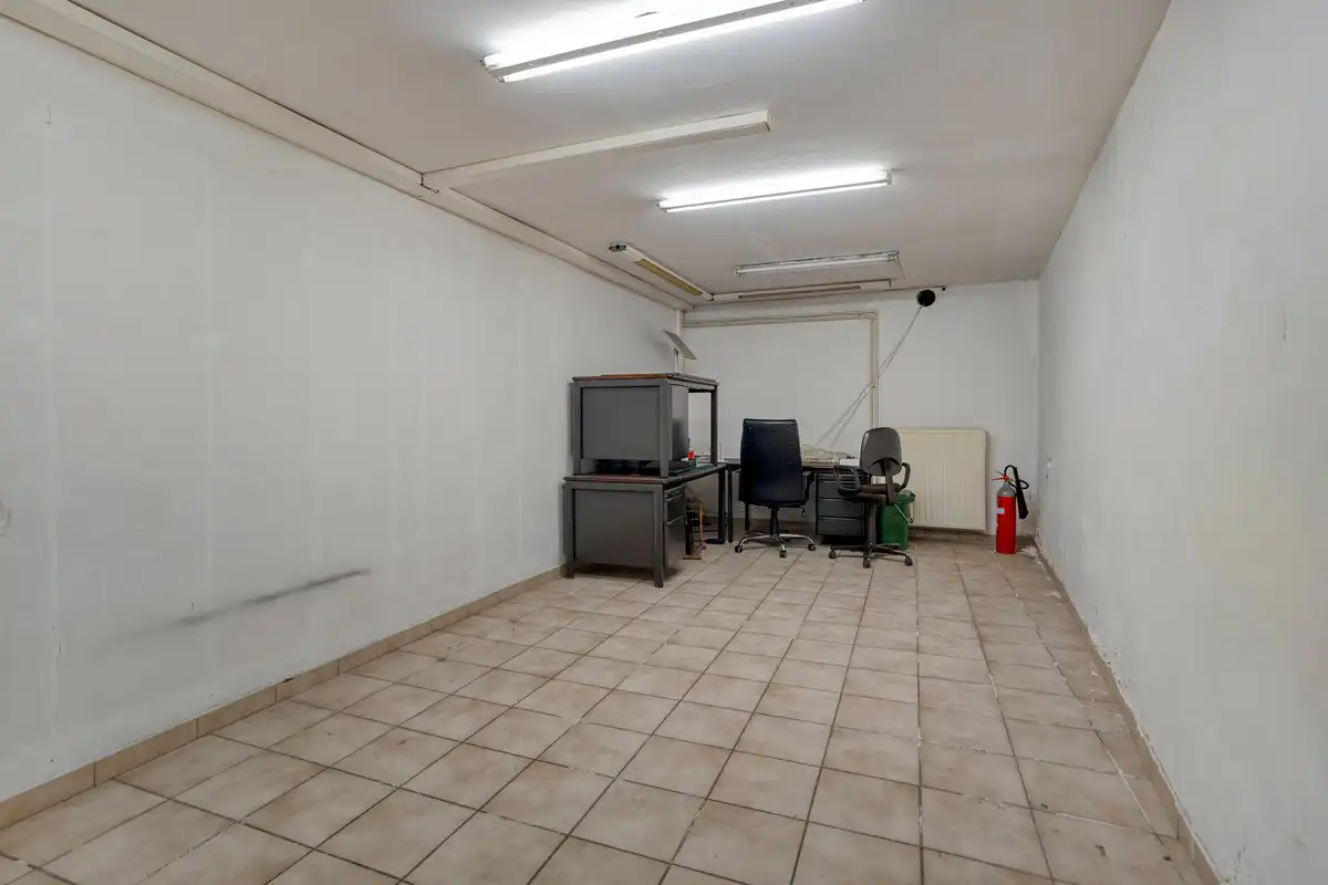 UITZONDERLIJK HANDELSHUIS MET GERENOVEERD DUPLEXAPPARTEMENT OP TOPLOCATIE IN CENTRUM TONGEREN. foto 25