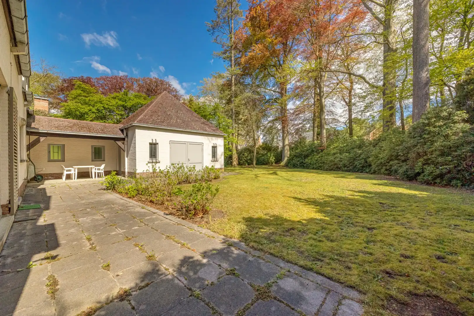 Villa met praktijkruimte en dubbele garage op riant perceel van 2.010 m² te Schoten foto 21