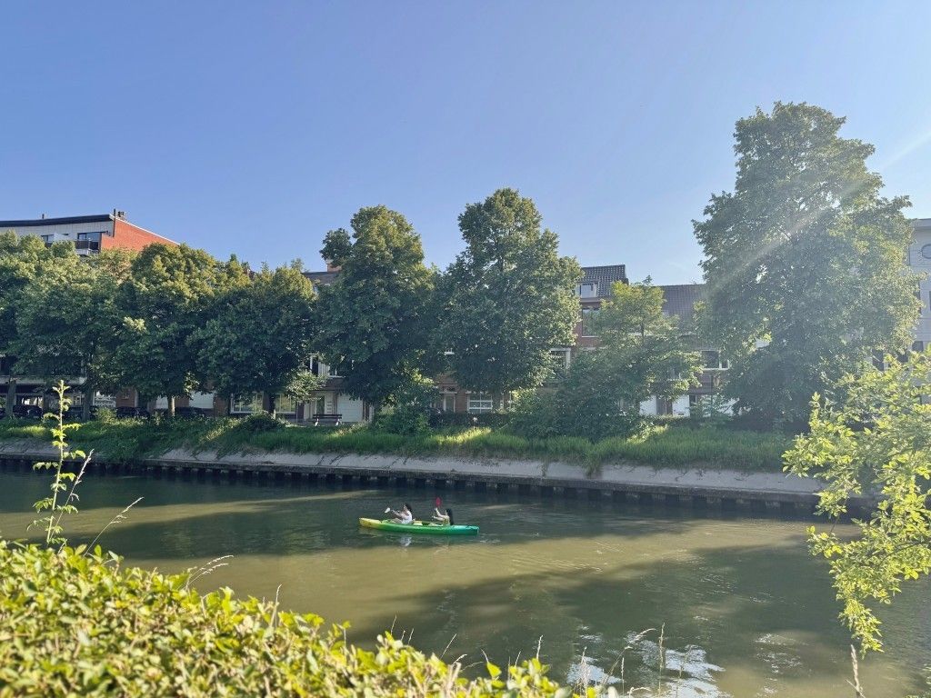 Hoofdfoto van de publicatie: Charmant gelijkvloersappartement met zicht op de Leie, vlak bij het Sint-Pietersstation
