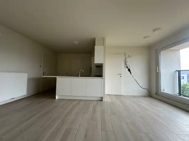 Recent één-slpk app met terras en staanplaats! foto 2
