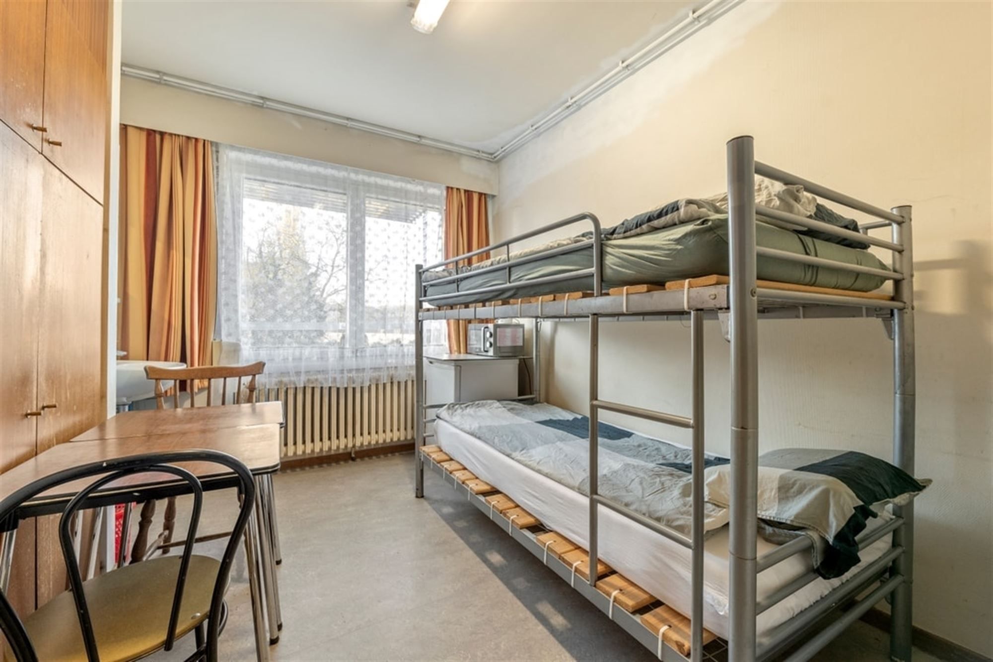 VERGUND GEMEENSCHAPSHUIS MET 15 INDIVIDUELE KAMERS foto 28