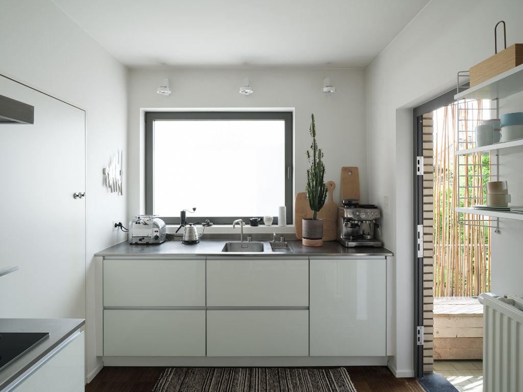 Kwalitatieve design bel-étage met 3 slaapkamers (mogelijkheid tot 5), bureauruimte en goed georiënteerde tuin te Sint-Amandsberg. foto 11
