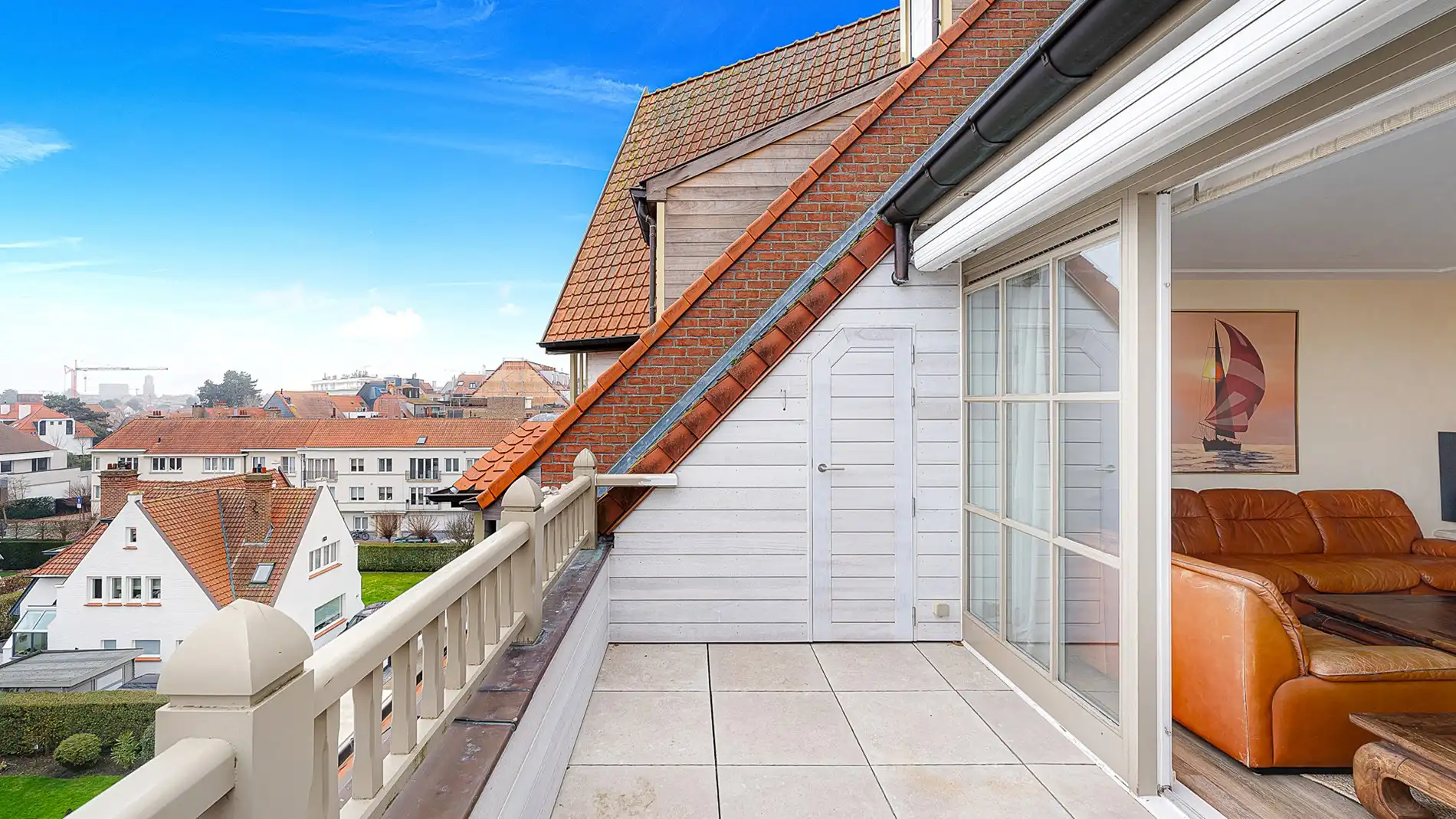 Ruim, zongericht dakappartement op toplocatie te koop foto 4