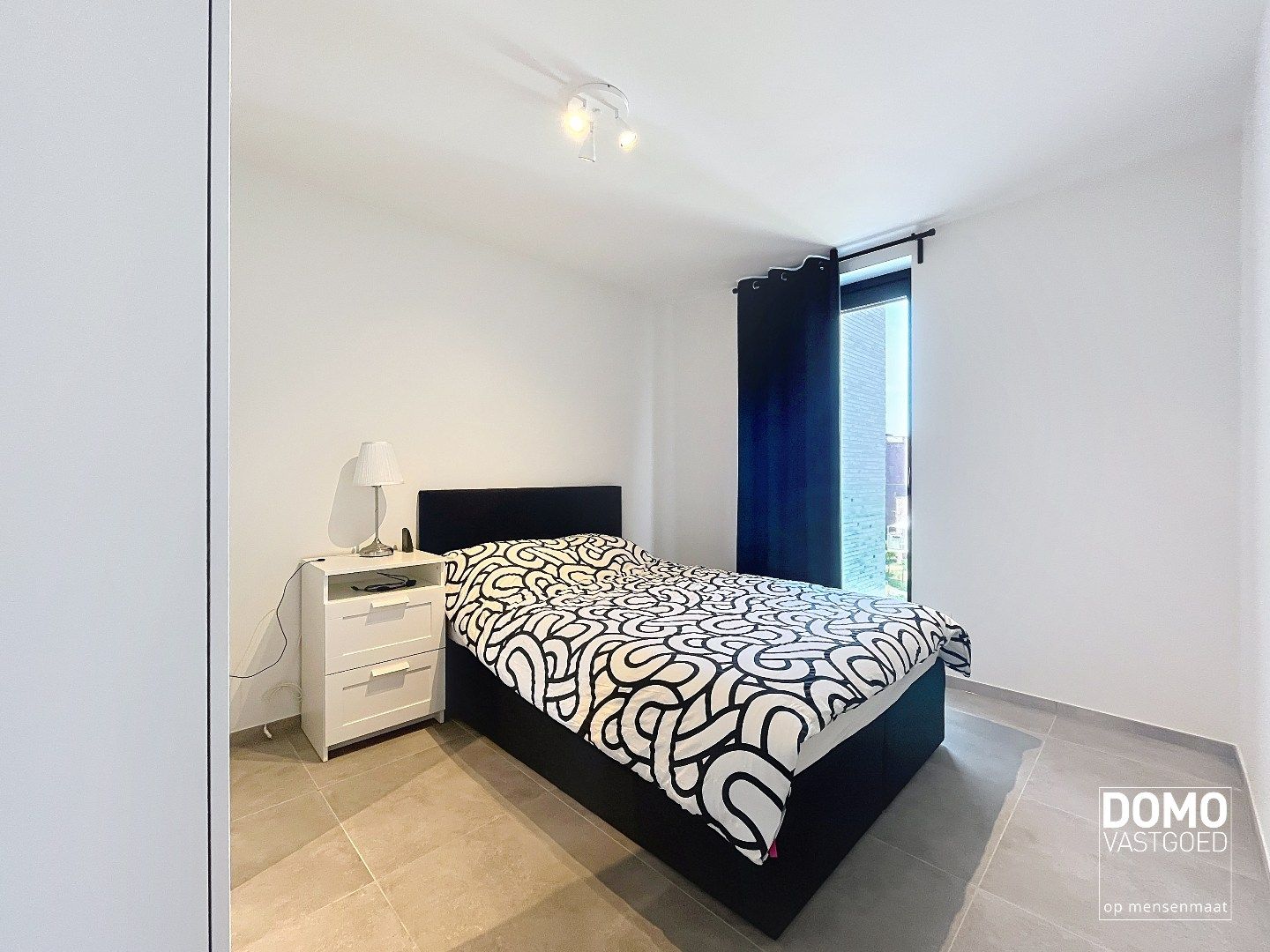 NIEUWBOUWAPPARTEMENT MET 2 SLAAPKAMERS, RUIM TERRAS, ONDERGRONDSE AUTOSTANDPLAATS EN KELDERBERGING IN MAASMECHELEN foto 10