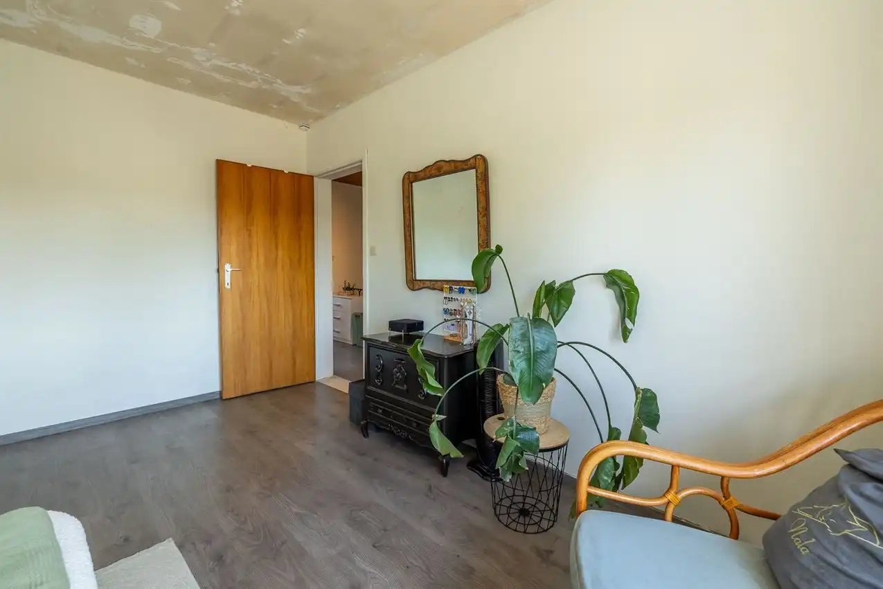 Ruime retrowoning met EPC C,  zuidtuin en achterliggende toegang. foto 19