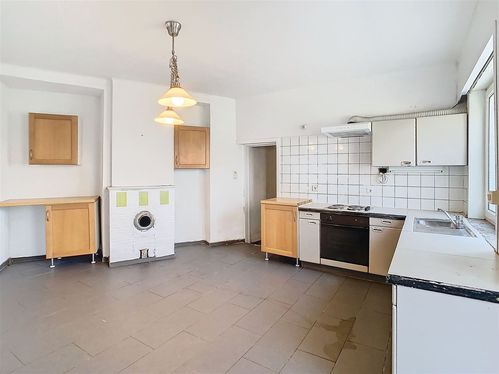 Te renoveren woning met 3 slpks, opp 69 ca foto 9