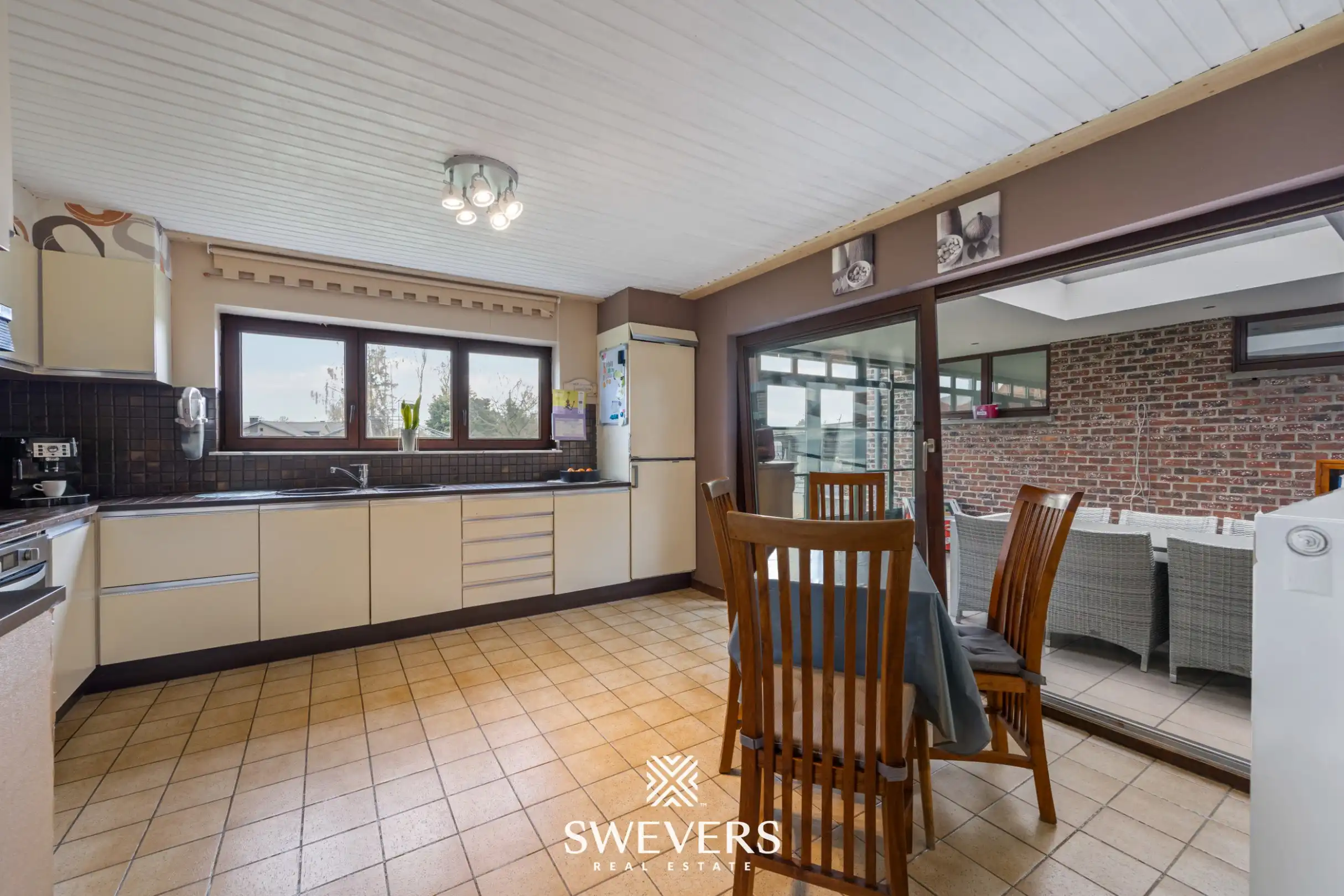 Zonnige woning met ruime zuid georiënteerde tuin in het rustige Diepenbeek foto 10