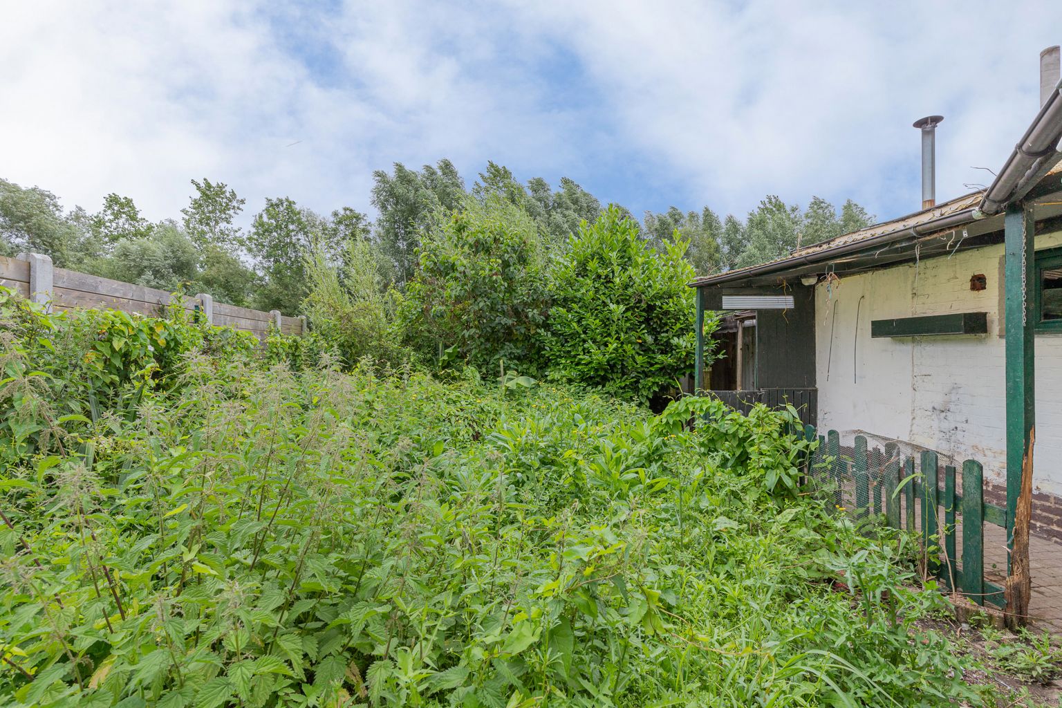 Te renoveren woning, gelegen in een rustige straat te Meise. foto 15