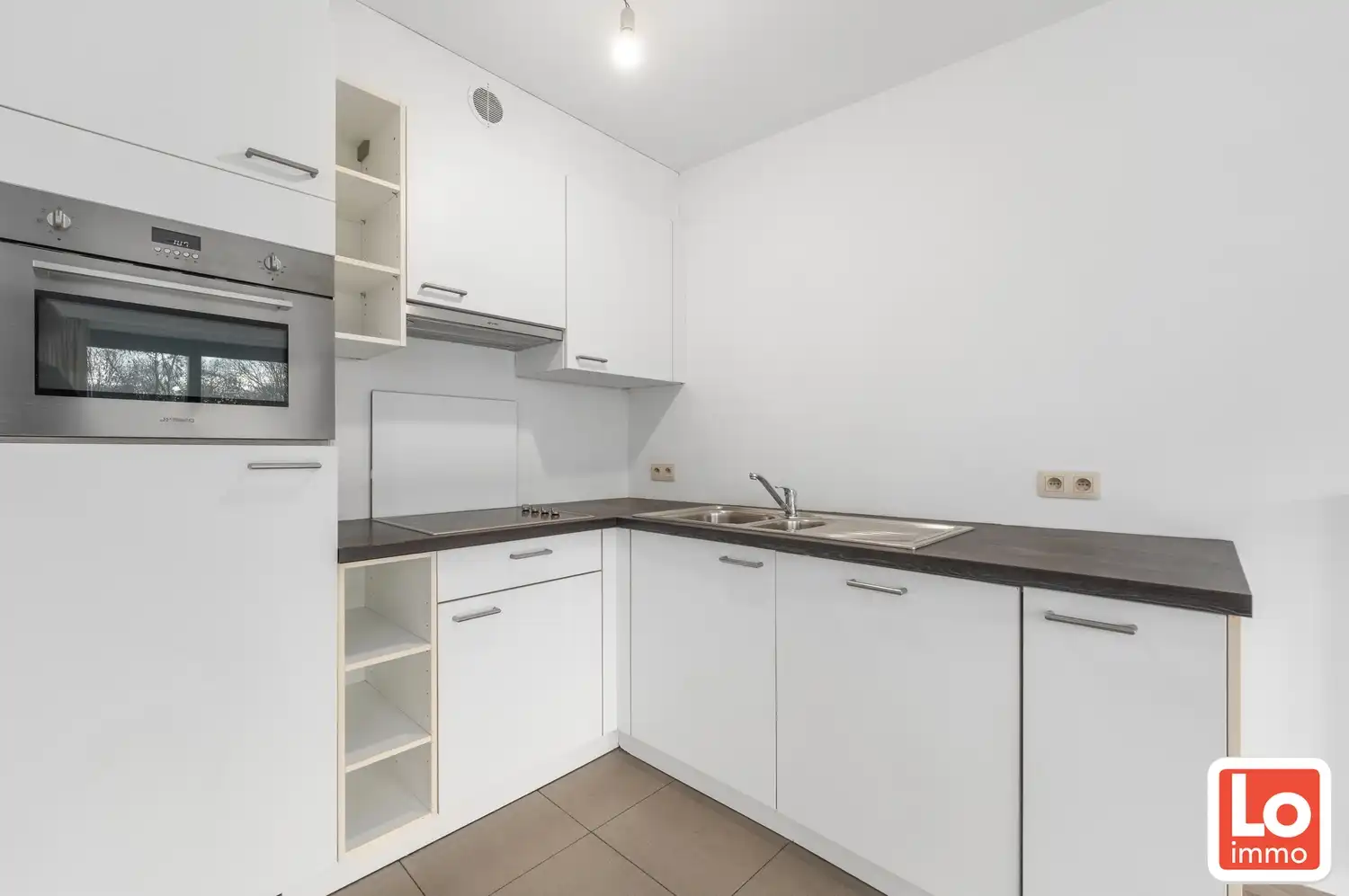 Mooi appartement met 2 slaapkamers en zuid-gericht terras in centrum Lochristi foto 5
