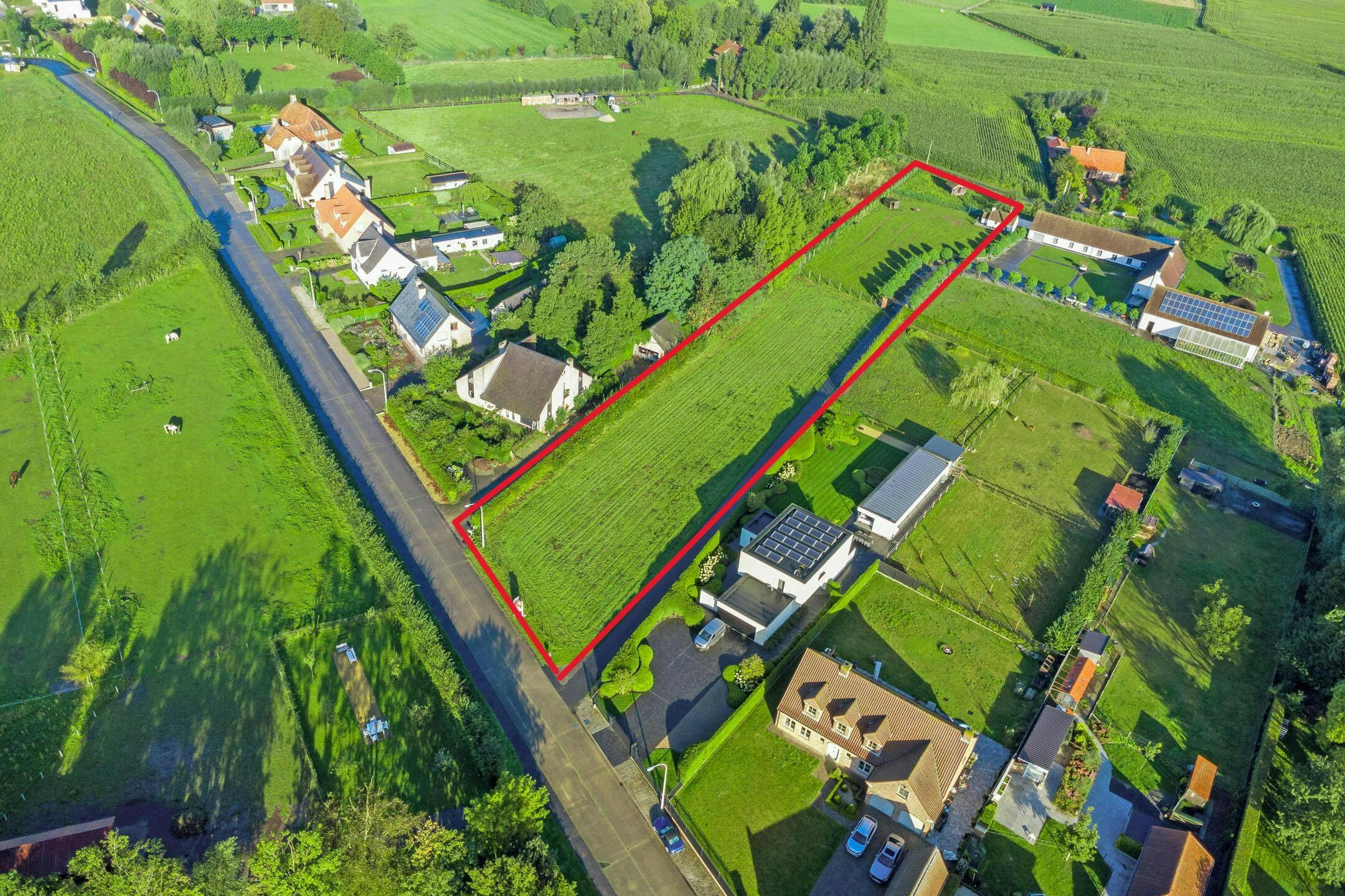 Bouwgrond (2850m²) voor open bebouwing te koop in Waregem foto {{pictureIndex}}