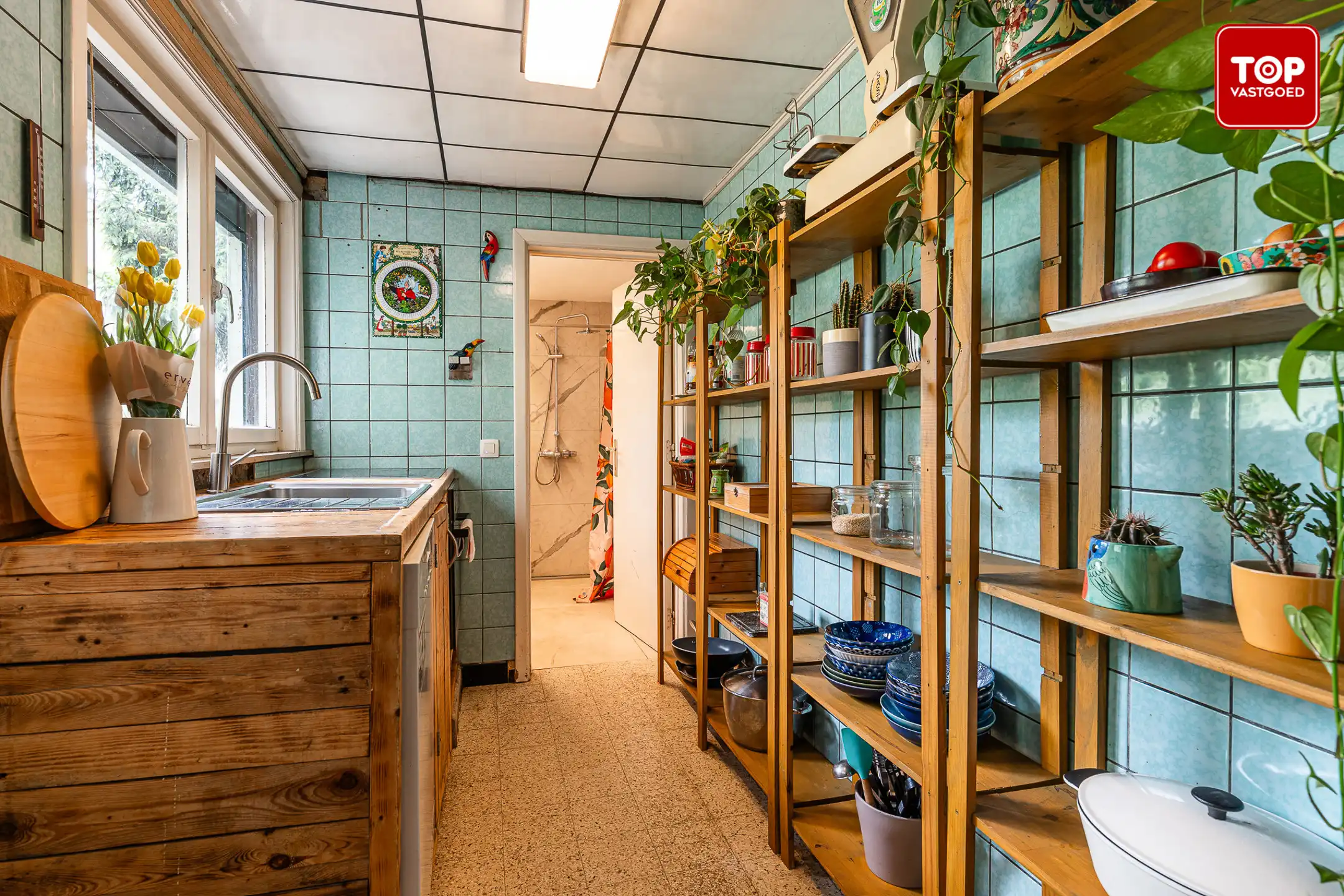 Woning met 3 slaapkamers en leuke tuin op toplocatie. foto 9