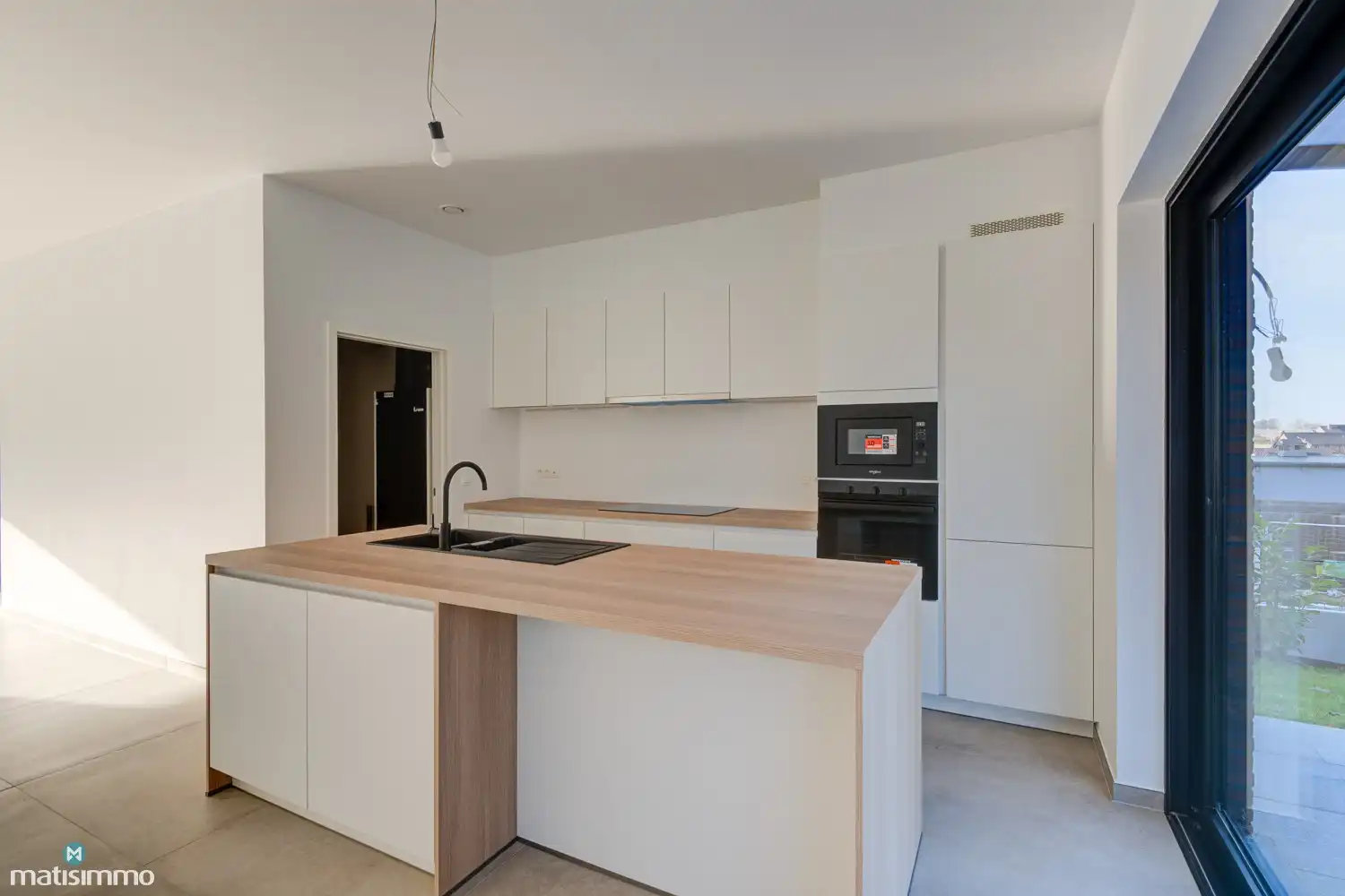 VOLLEDIG AFGEWERKTE EN GESCHILDERDE NIEUWBOUWWONING (EPB E10) MET 3 SLAAPKAMERS, OVERDEKT TERRAS, 2 GARAGES, KELDER EN AANGELEGDE TUIN IN WERM foto 8