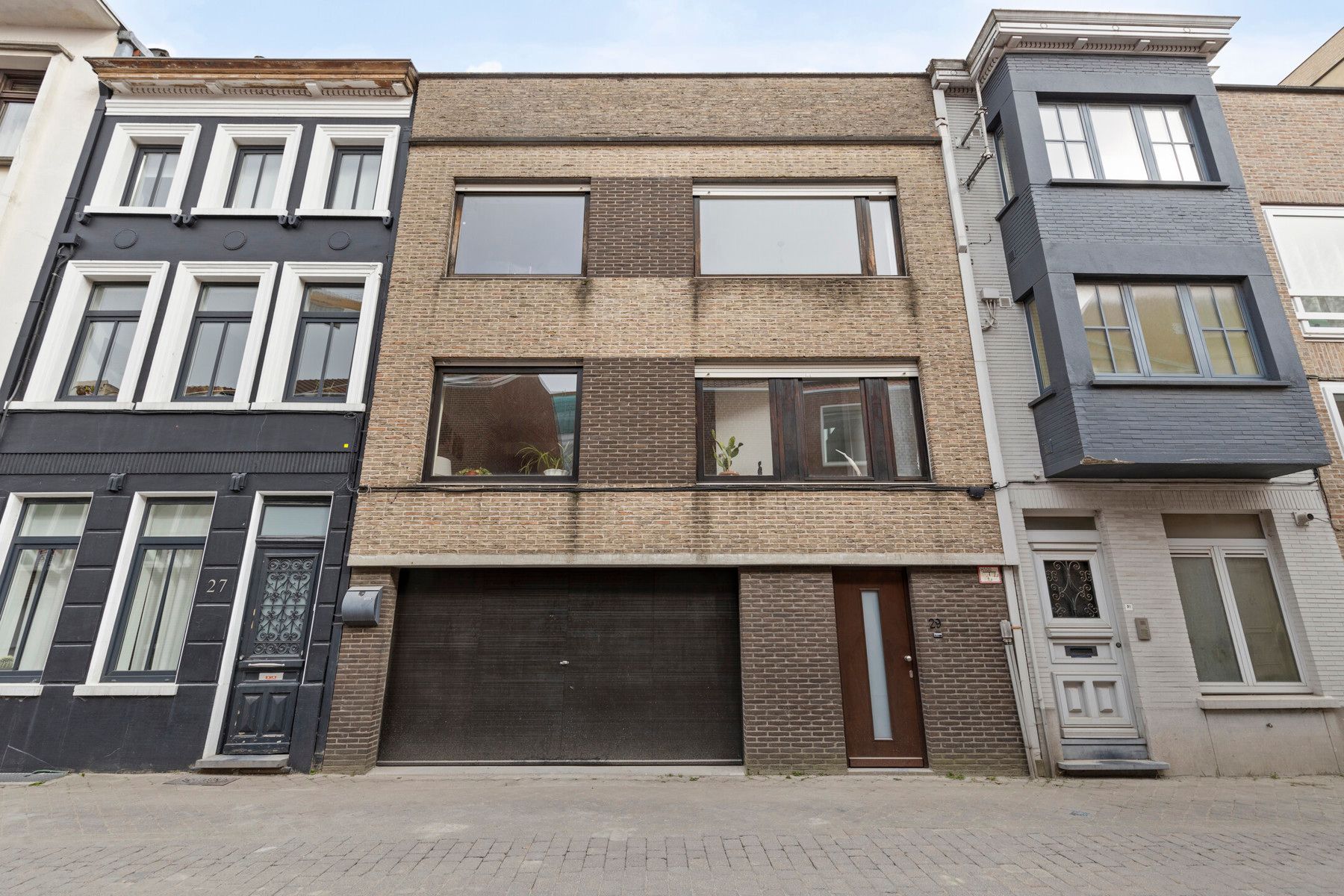 Instapklare stadswoning met grote garage ! foto 20
