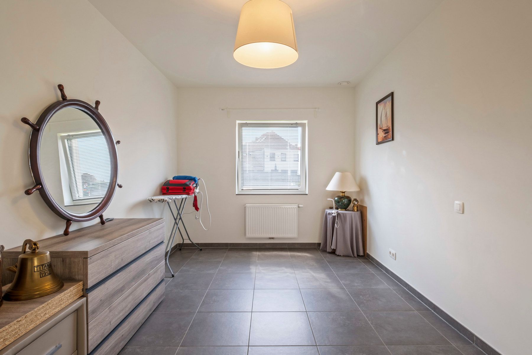 Nieuwstaat gelijkvloers app in hartje Loppem foto 7