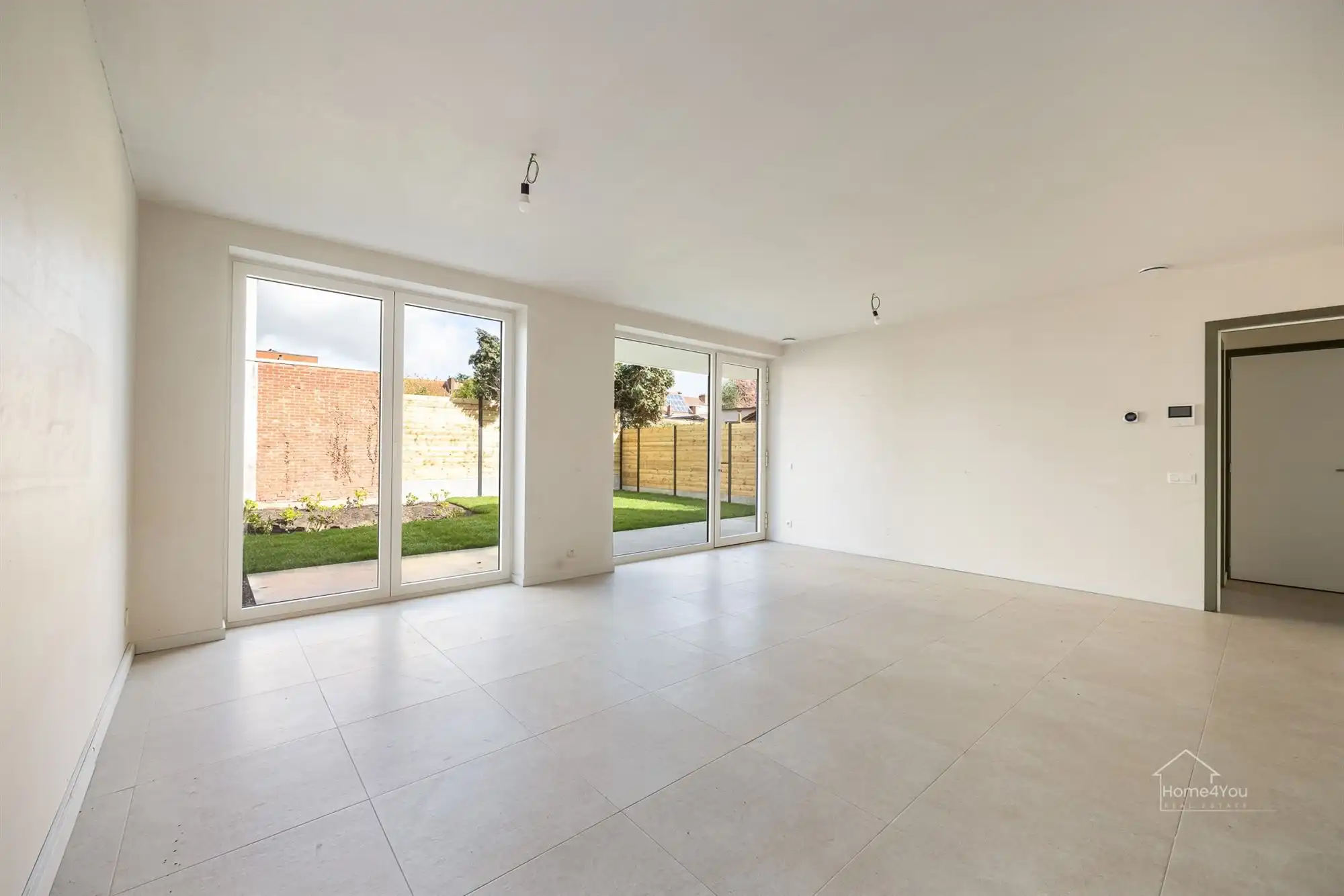 Nieuwbouw gelijkvloers appartement met aangename tuin foto 2