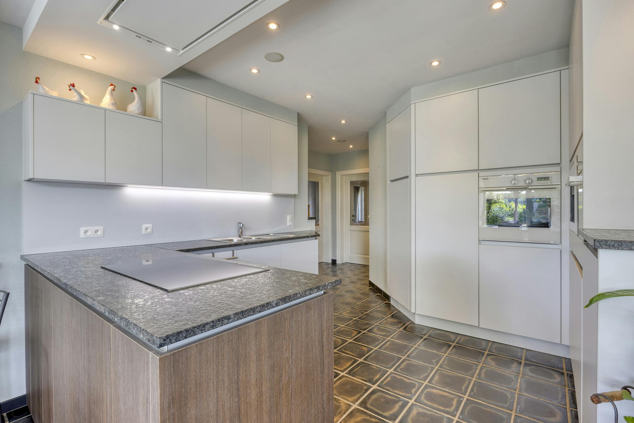 Riante zorgwoning/kangoeroewoning met loods te koop foto 9