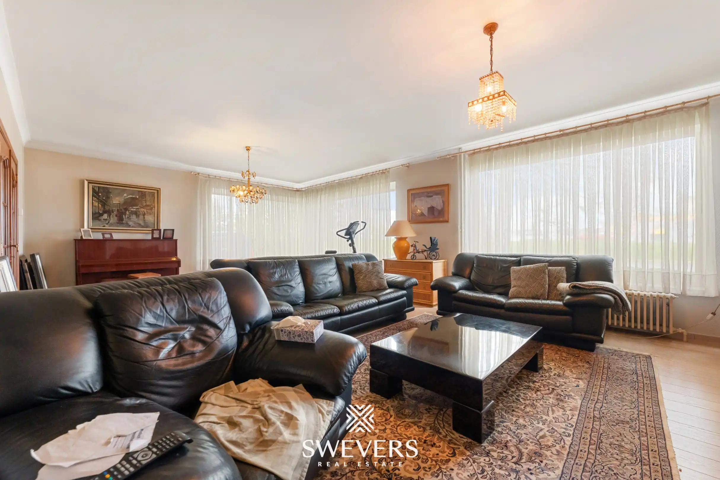 Ruime halfopen bebouwing met 4 slaapkamers en veel renovatiepotentieel op topligging in Hasselt foto 3