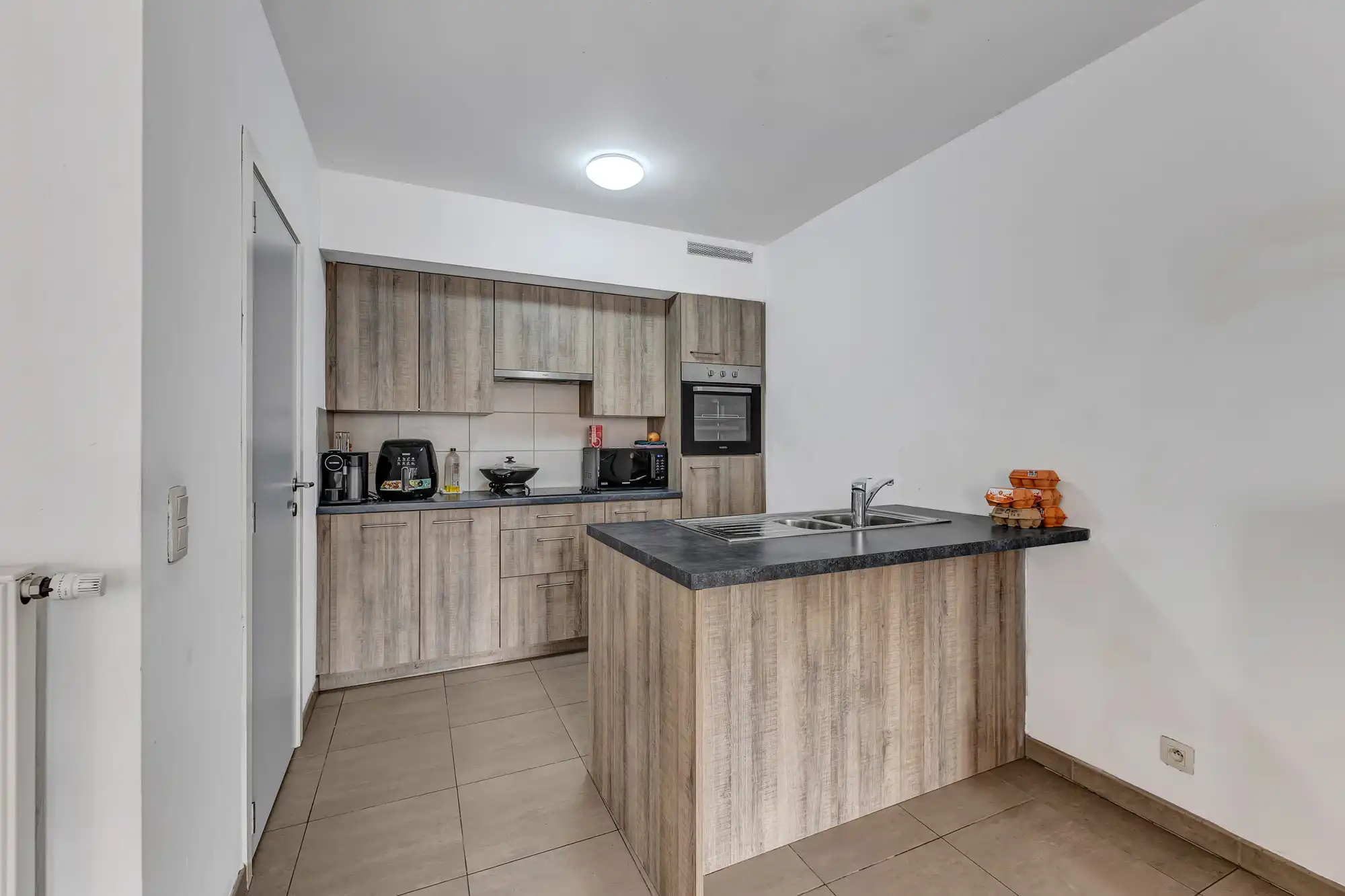 2-slaapkamer app met staanplaats in hartje Ninove foto 7