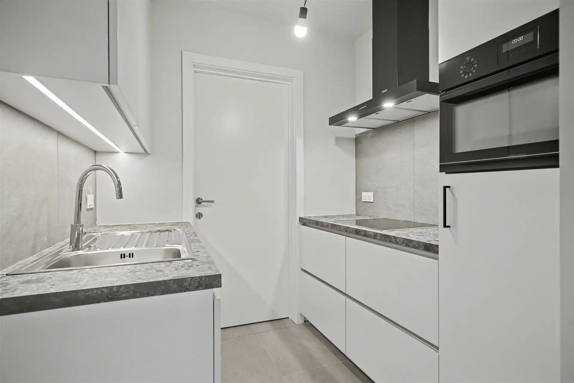 Afgewerkt nieuwbouwappartement met 1 slaapkamer en garage (67m²) foto 6