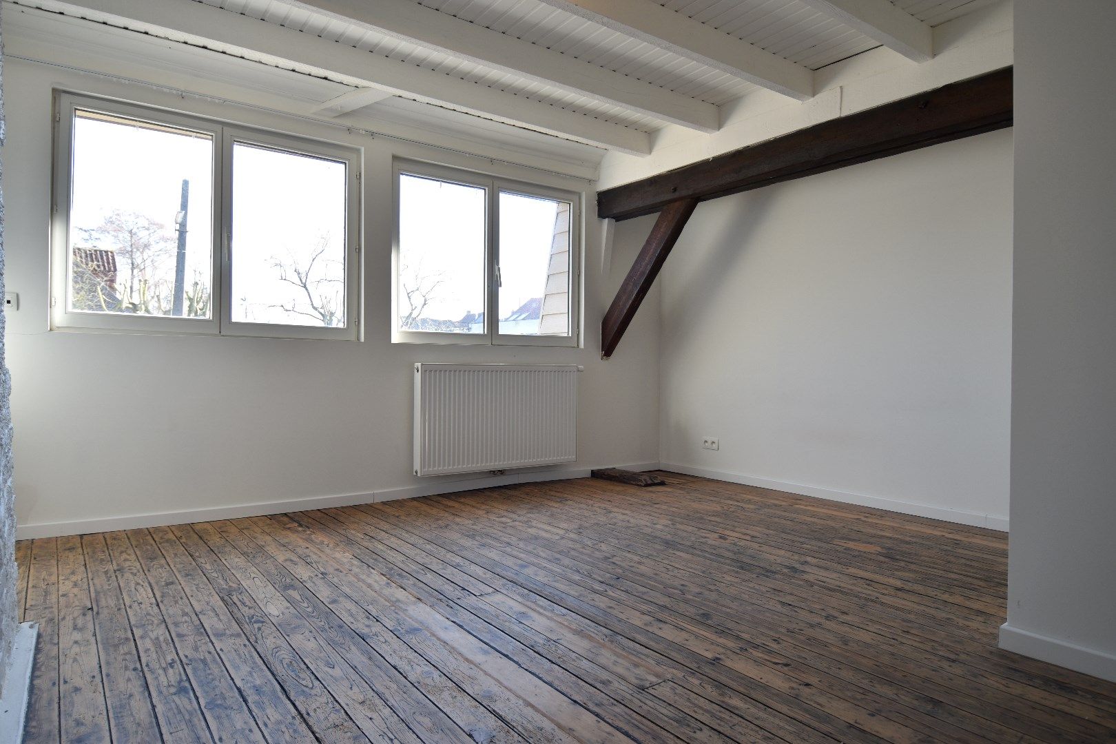 Energiezuinige (label B!) gezinswoning met praktijkruimte, 3 slaapkamers en tuin te koop in hartje Bellegem foto 8