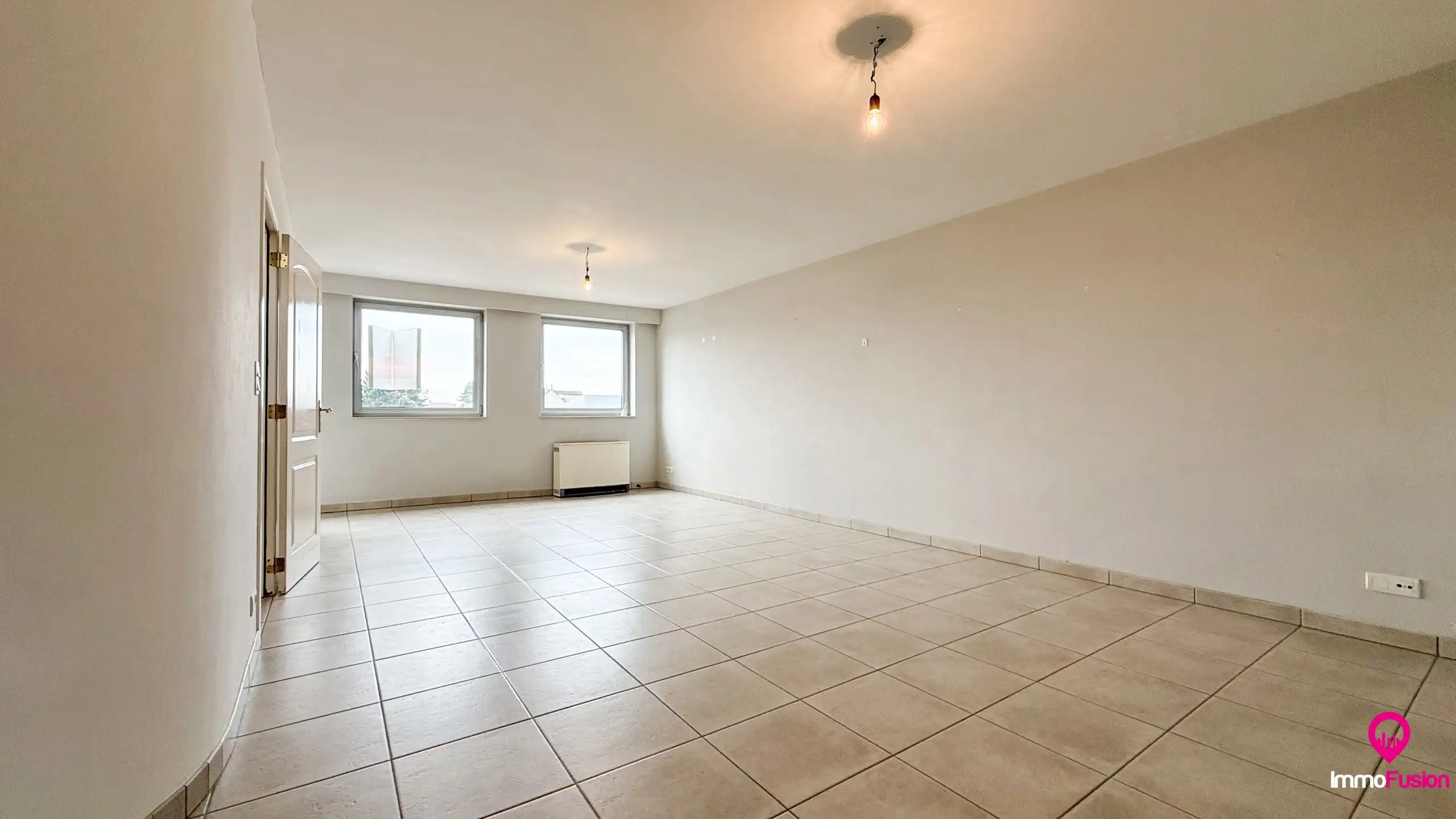 Duplex met 3 slaapkamers met dakterras in hartje Zolder foto 2