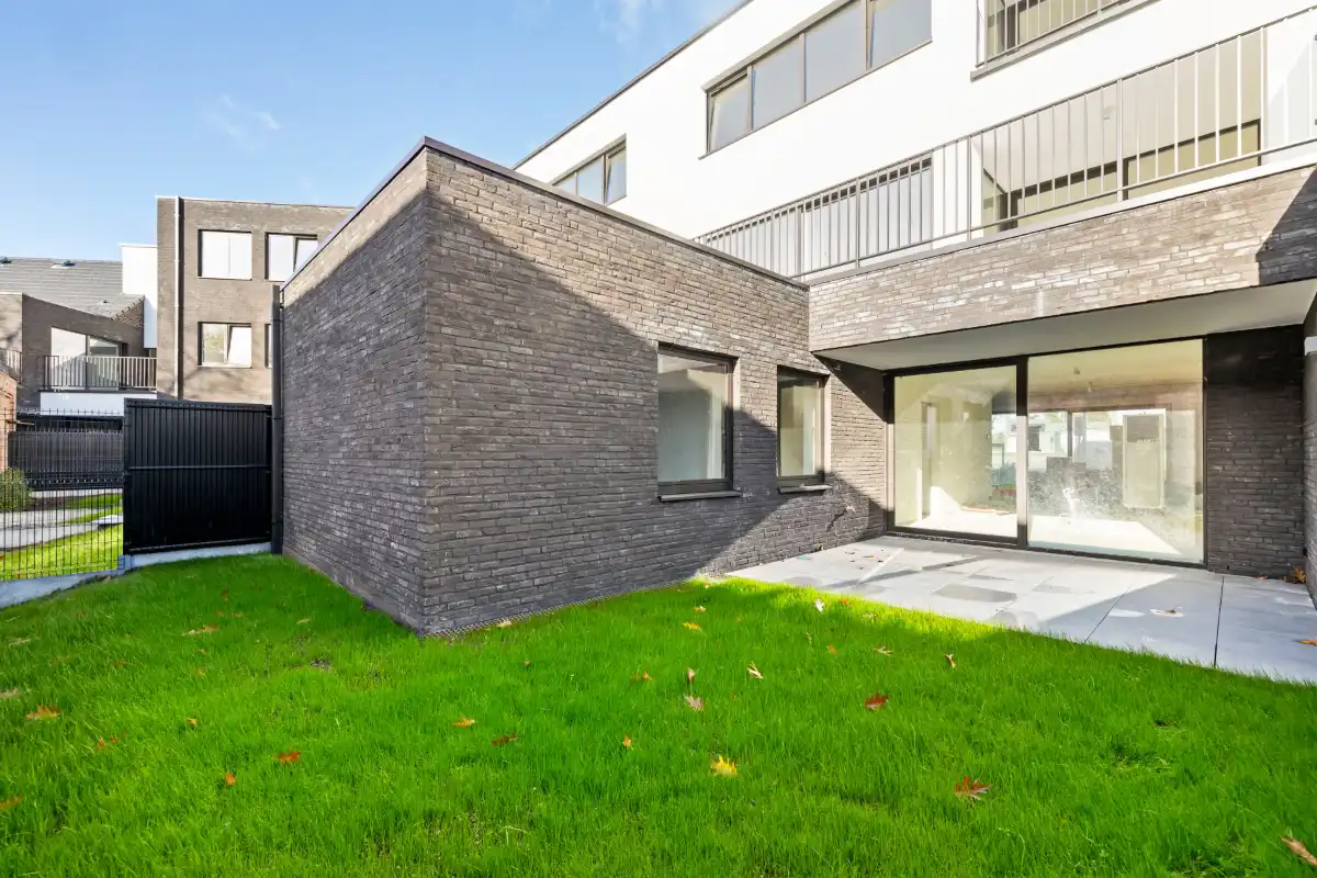 Exclusief BEN-nieuwbouwappartement in het hart van Oudegem – luxueus wonen aan 6% btw (onder voorwaarden) foto {{pictureIndex}}