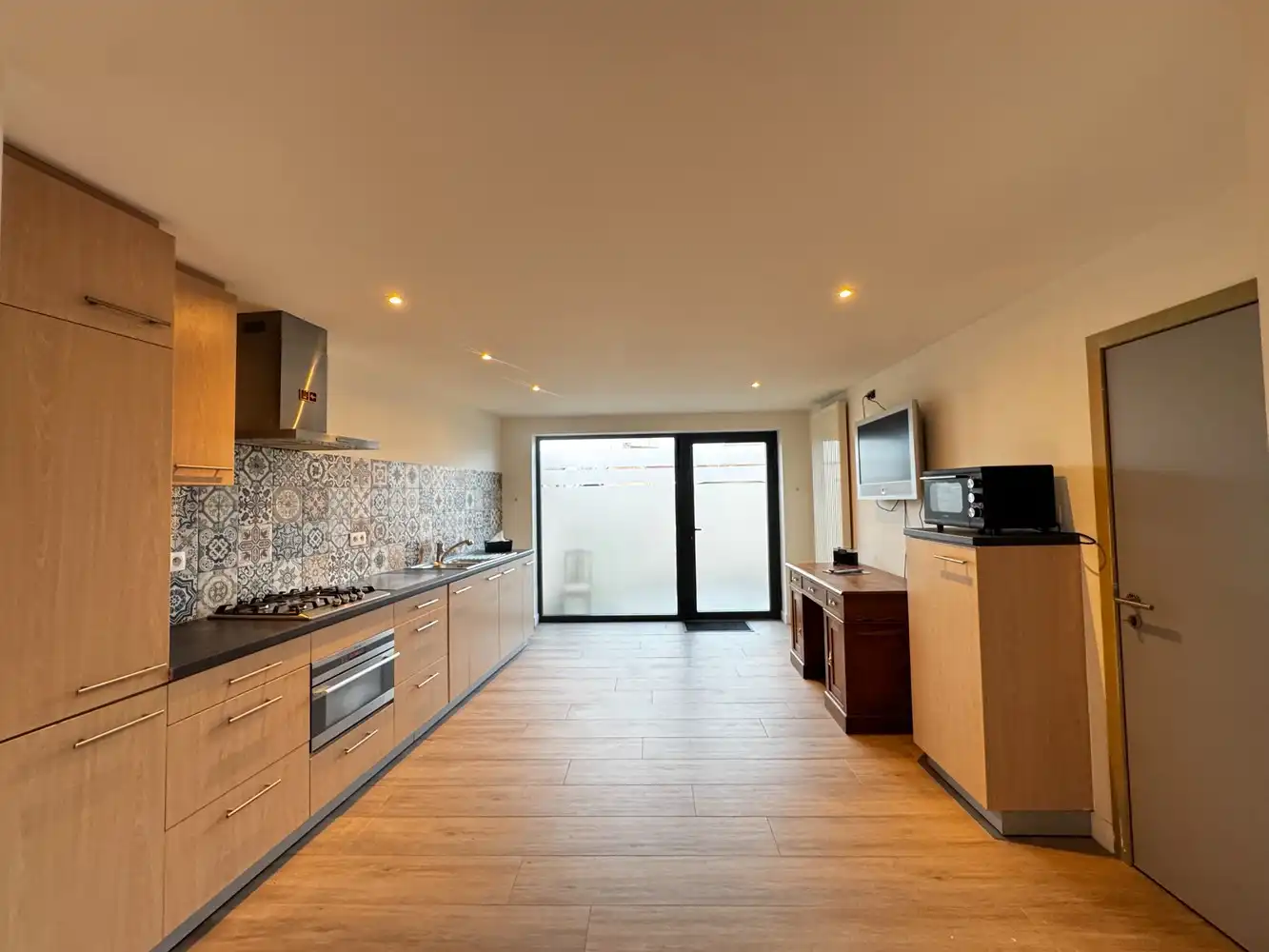 Veelzijdige woon- en werkcombinatie op een centrale ligging in Munsterbilzen foto 8