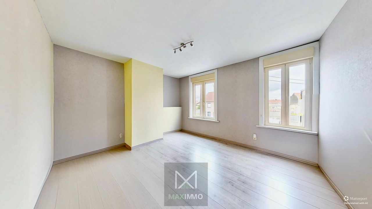 Instapklare, lichtrijke gezinswoning met grote tuin te Menen foto 9