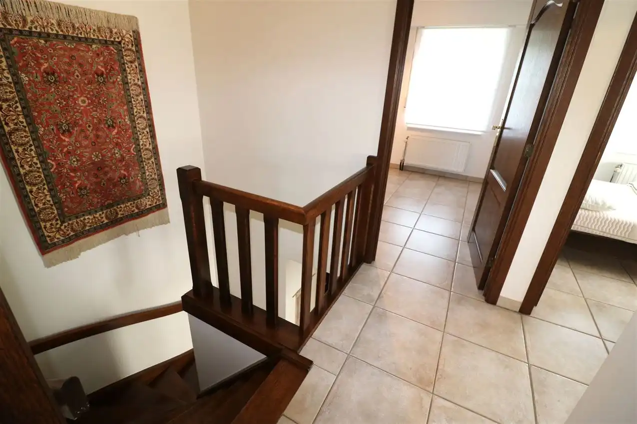 Gusting gelegen woning met 3 slp, garage en tuin foto 14