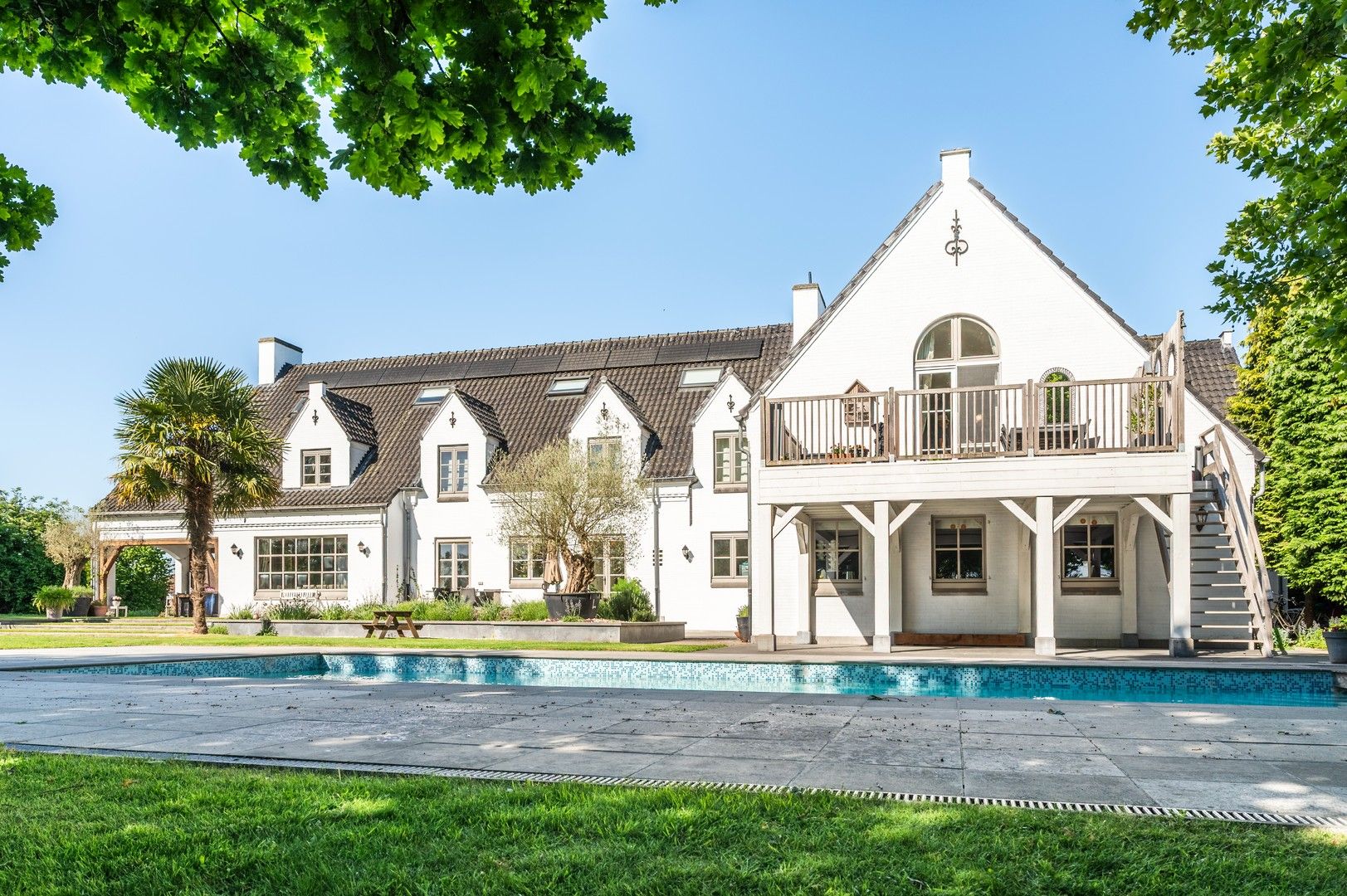 Charmante villa met zwembad en riante tuin in het groen van Temse! foto 2