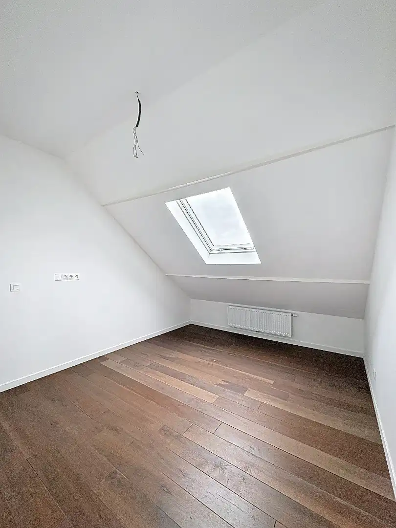 Elegant wonen in Tienen: gerenoveerde rijwoning met 3 slaapkamers en zuidwestgerichte tuin. foto 16