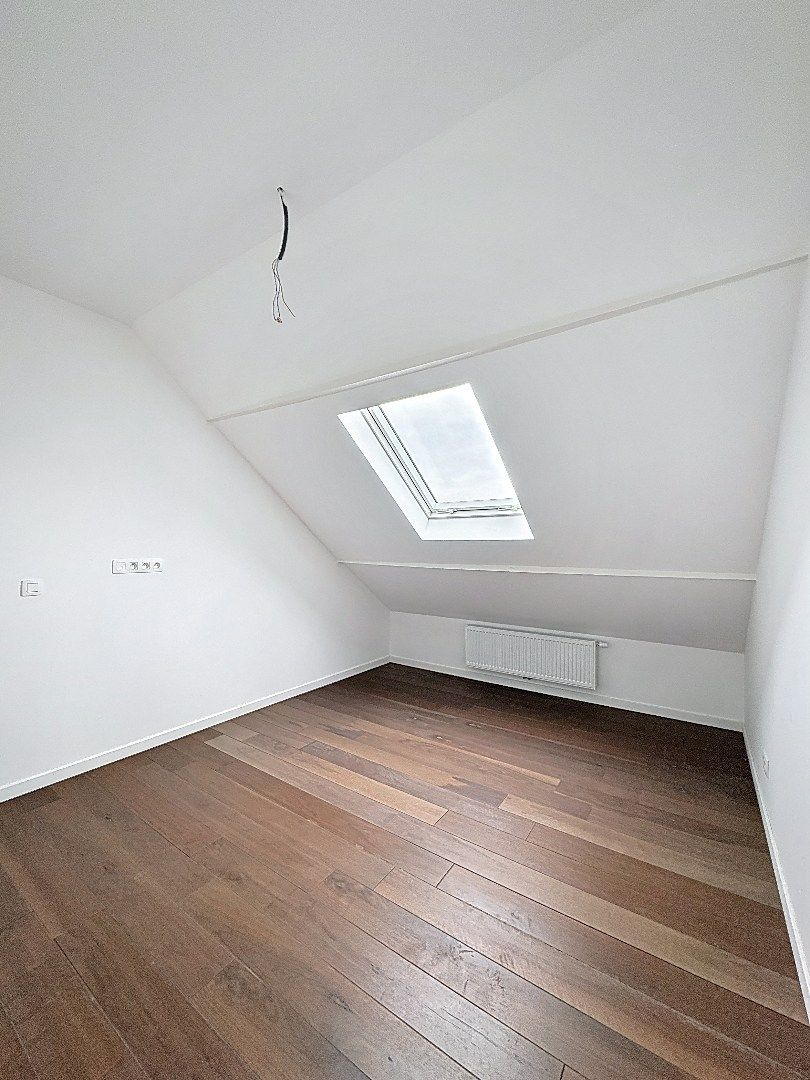 Elegant wonen in Tienen: gerenoveerde rijwoning met 3 slaapkamers en zuidwestgerichte tuin. foto 16