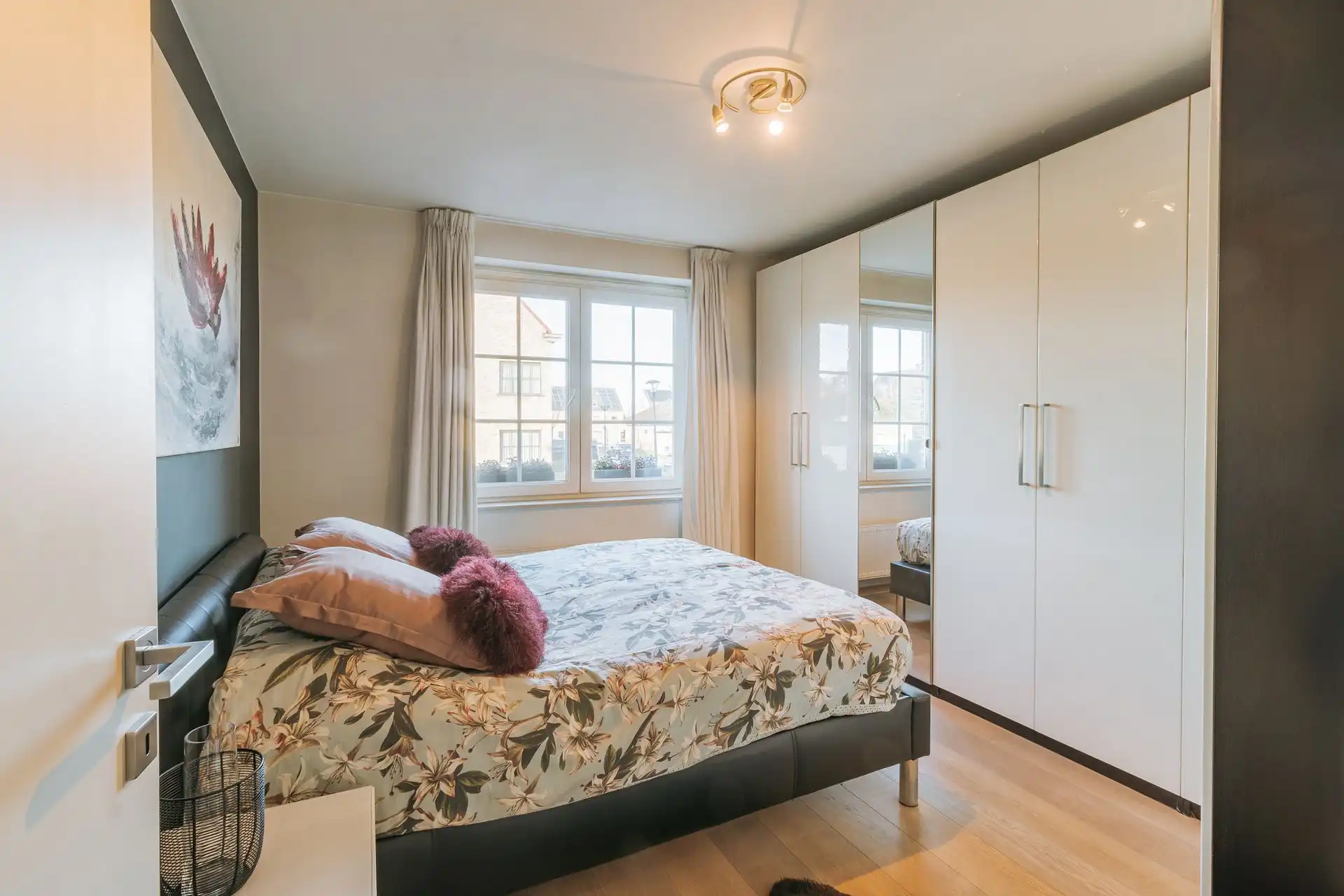 Instapklaar gelijkvloersappartement met tuin en garagebox foto 17