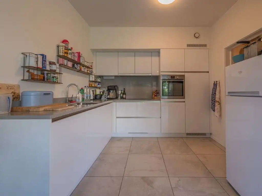 Modern gelijkvloers appartement met ruim terras en private tuin foto 10