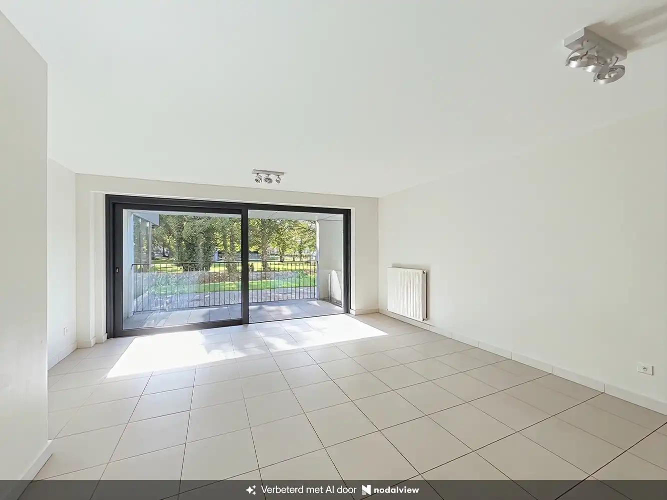 Ruim gelijkvloers appartement voor senioren met zicht op pastorietuin foto 3