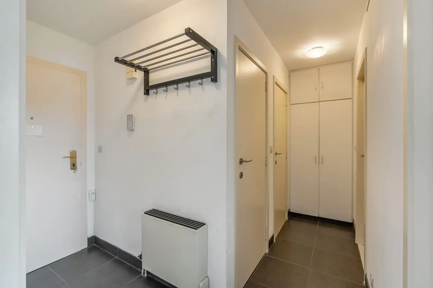 Centraal gelegen, gerenoveerd en energiezuinig appartement met 1 slaapkamer, een terras en een autostaanplaats te Leuven! foto 11