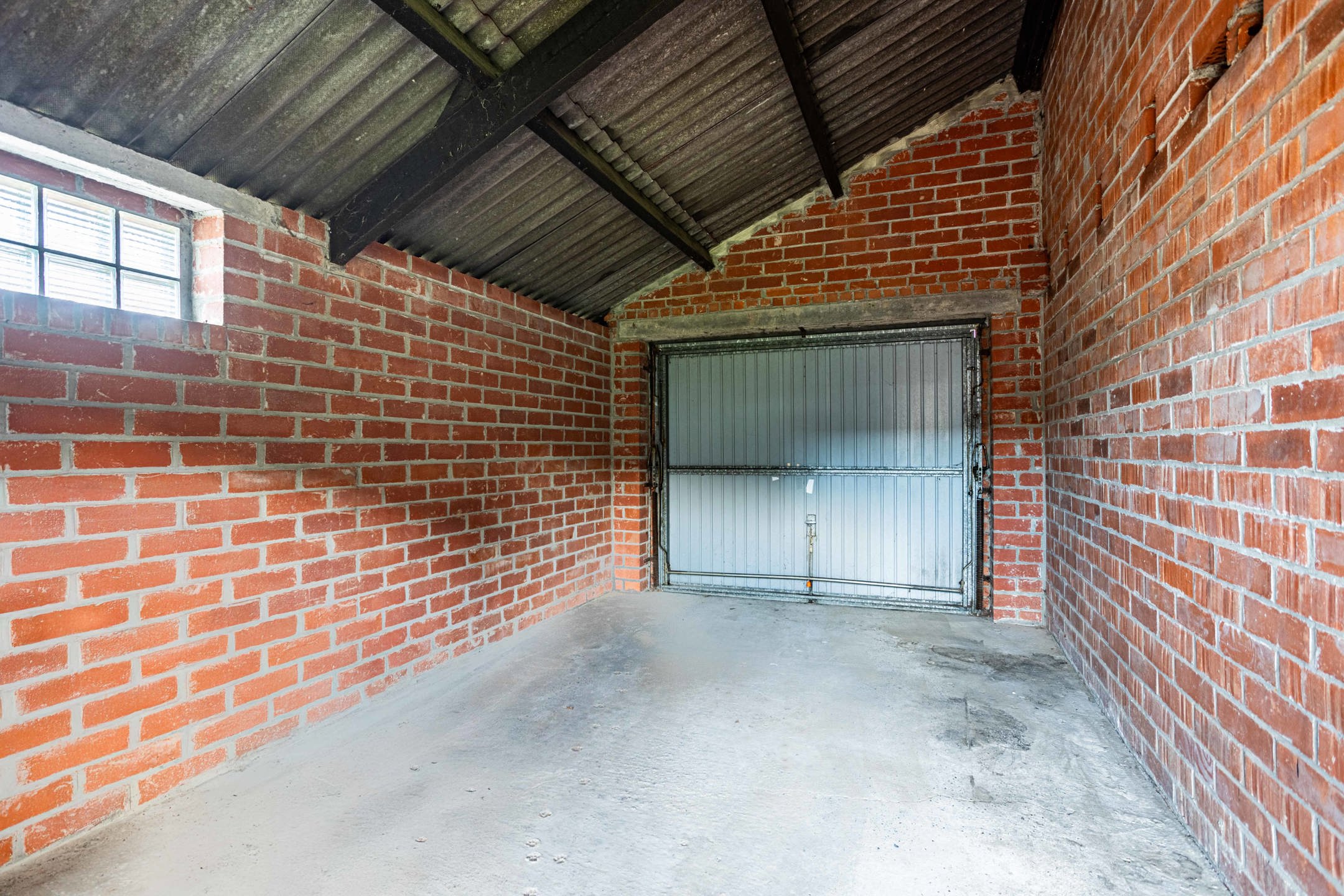 Woning met tuin en achterliggend perceel met oprit & garage! foto 21