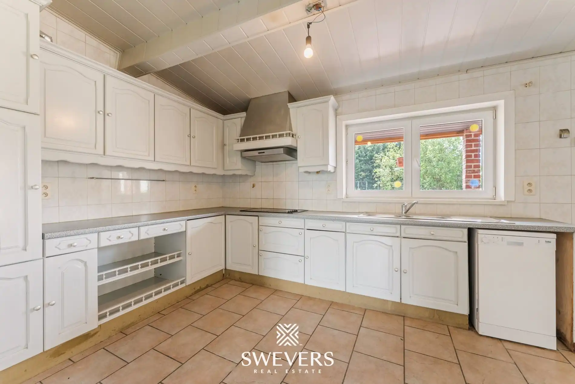 Charmante open bebouwing met 3 slaapkamers, zonnige tuin en renovatiepotentieel foto 9