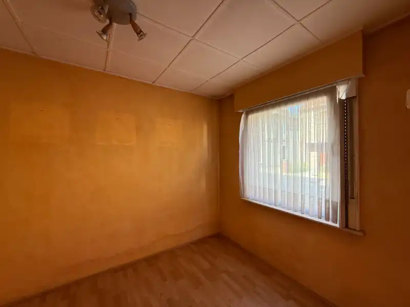 Te renoveren rijwoning met uitgang achteraan! foto 5