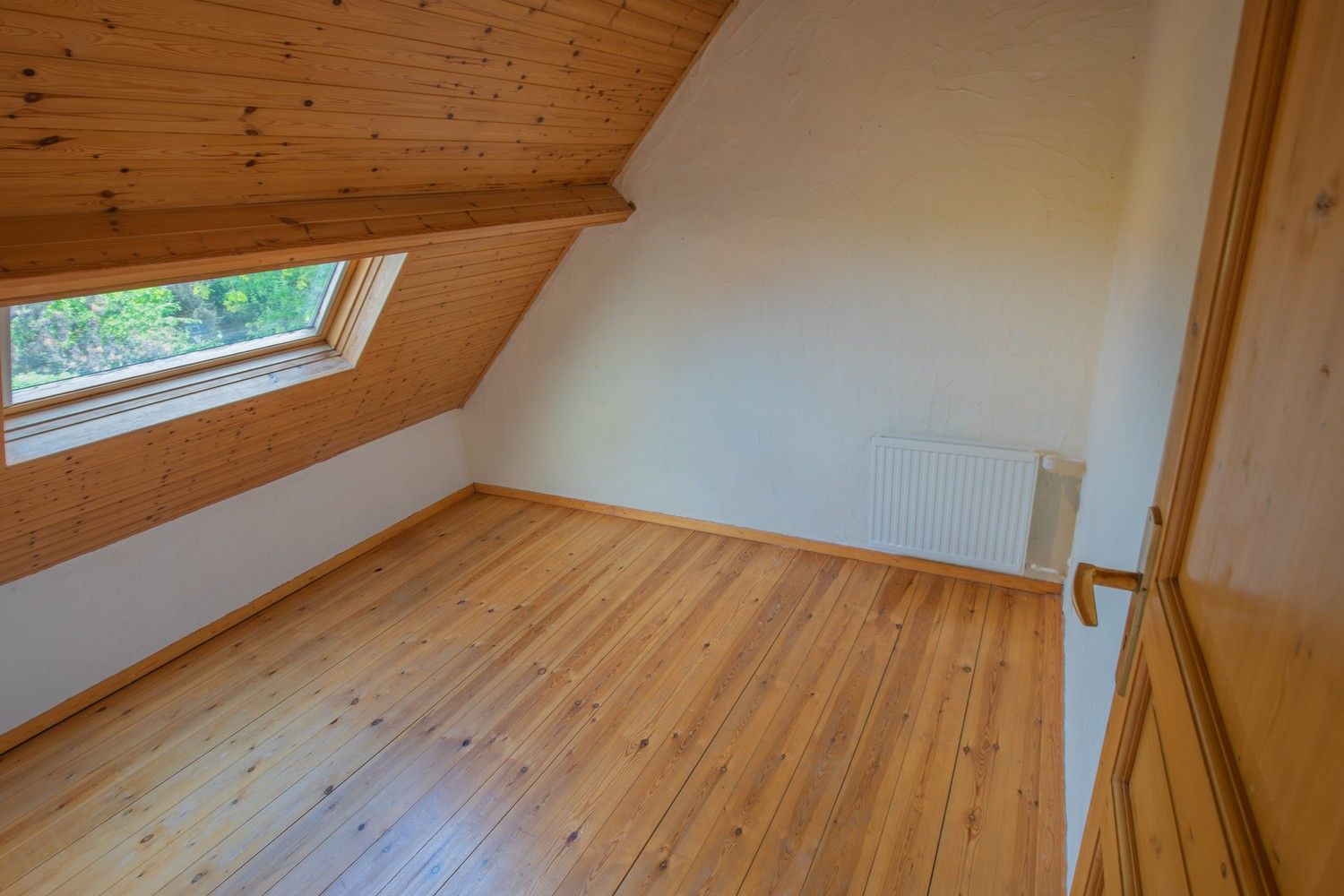 Charmante halfopen woning met 3 slaapkamers, ruime garage en gunstige ligging in Holsbeek foto 12