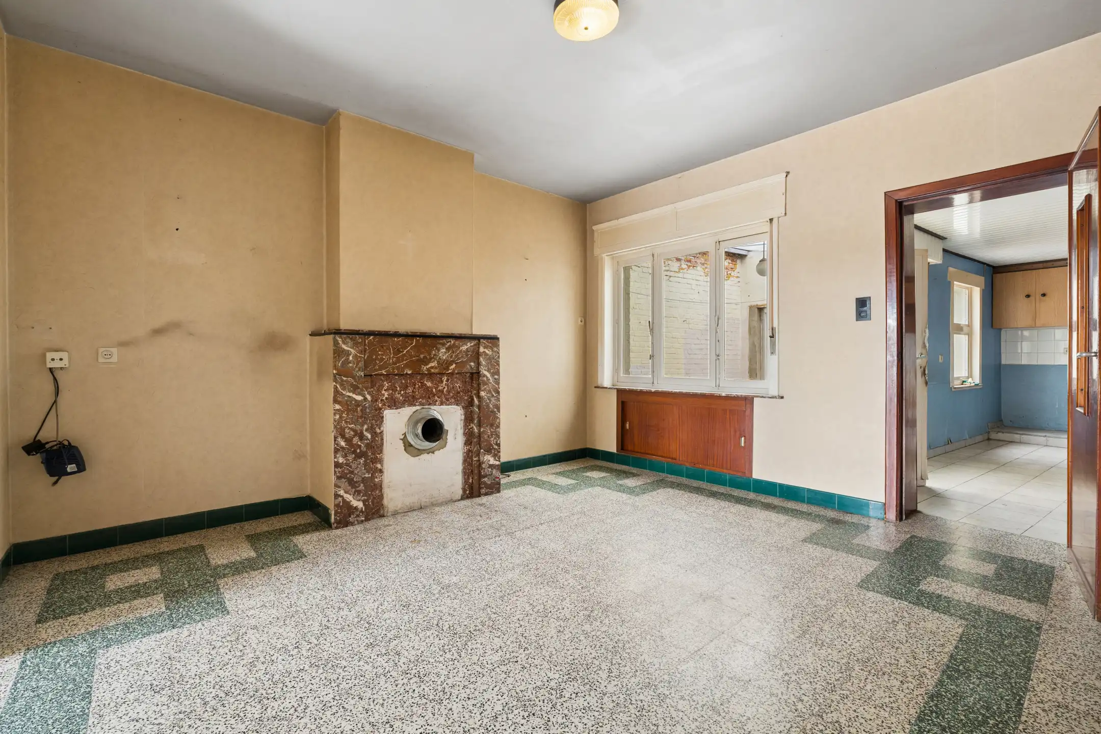 Te renoveren woning met tuin op centrale ligging foto 4