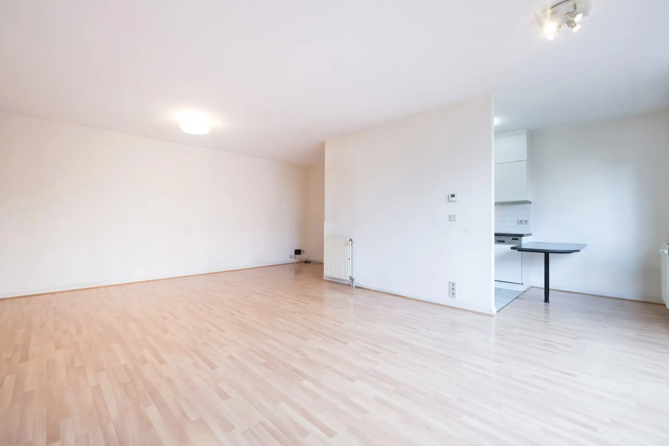 Europese wijk | Licht appartement met parking foto 4