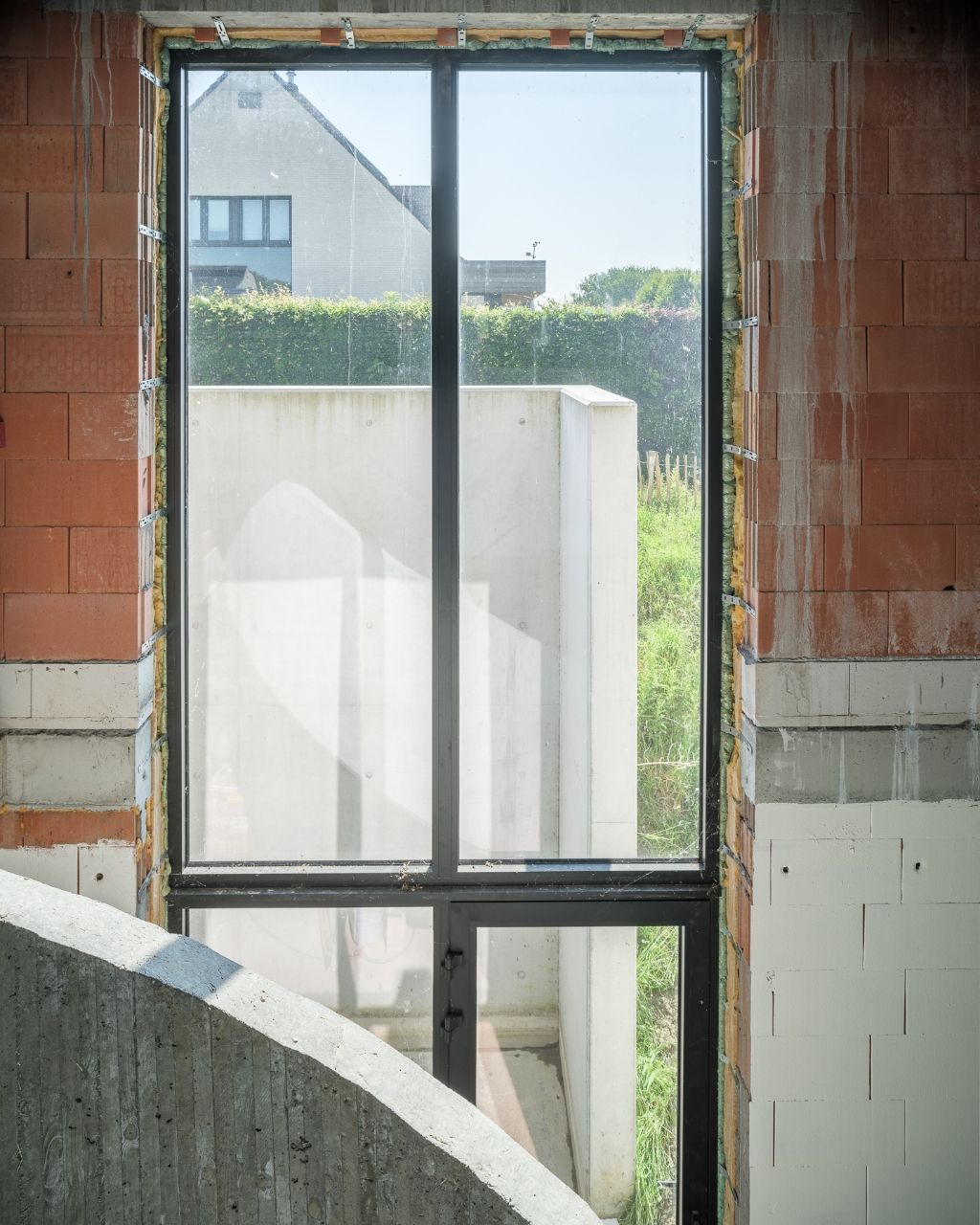 Architecturale casco-nieuwbouw bestaande uit een uitzonderlijke stapelwoning met onderliggende garage en adembenemende zichten over de Scheldevallei. foto 12