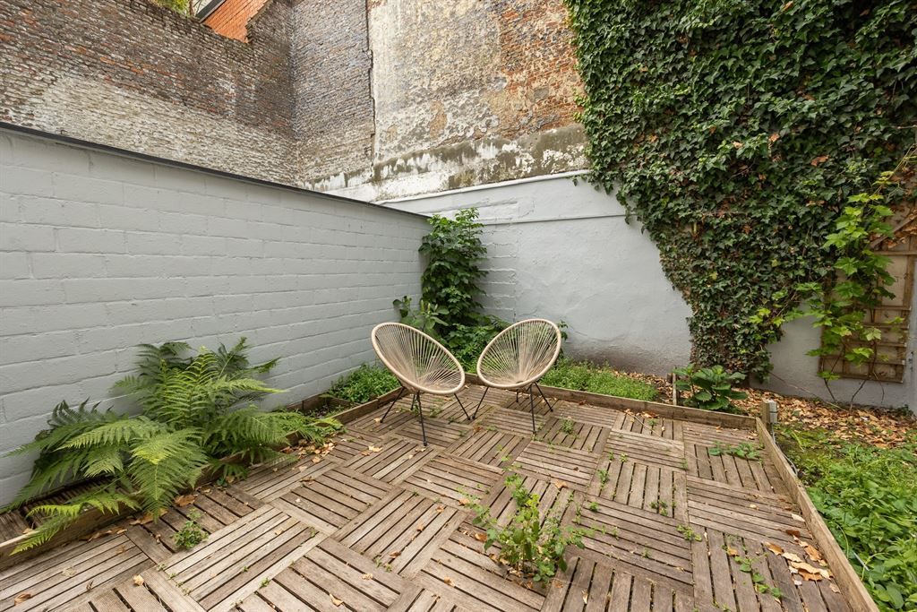 Uitzonderlijk gelijkvloersappartement met stadstuin foto 4