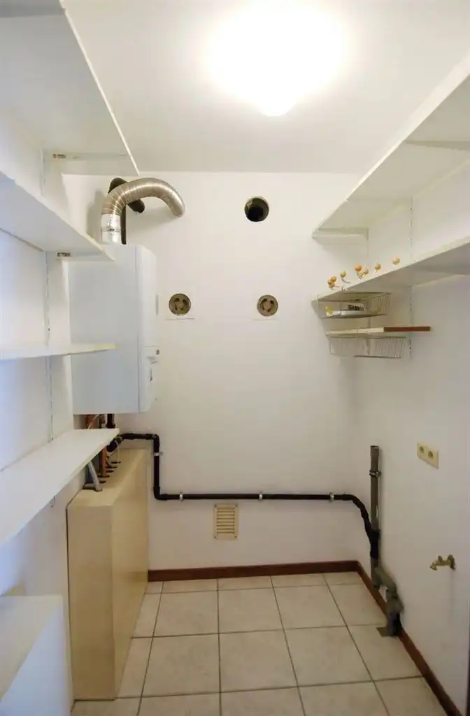 Gelijkvloers appartement met 2 slaapkamers en garagebox. foto 4