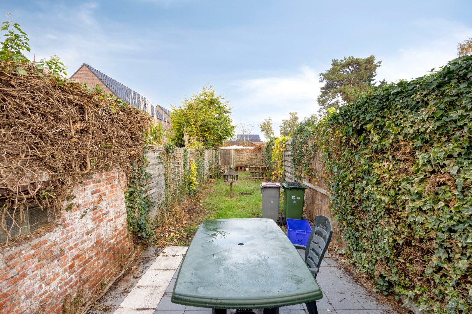 Te renoveren woning langs het centrum van Mol !  foto 19