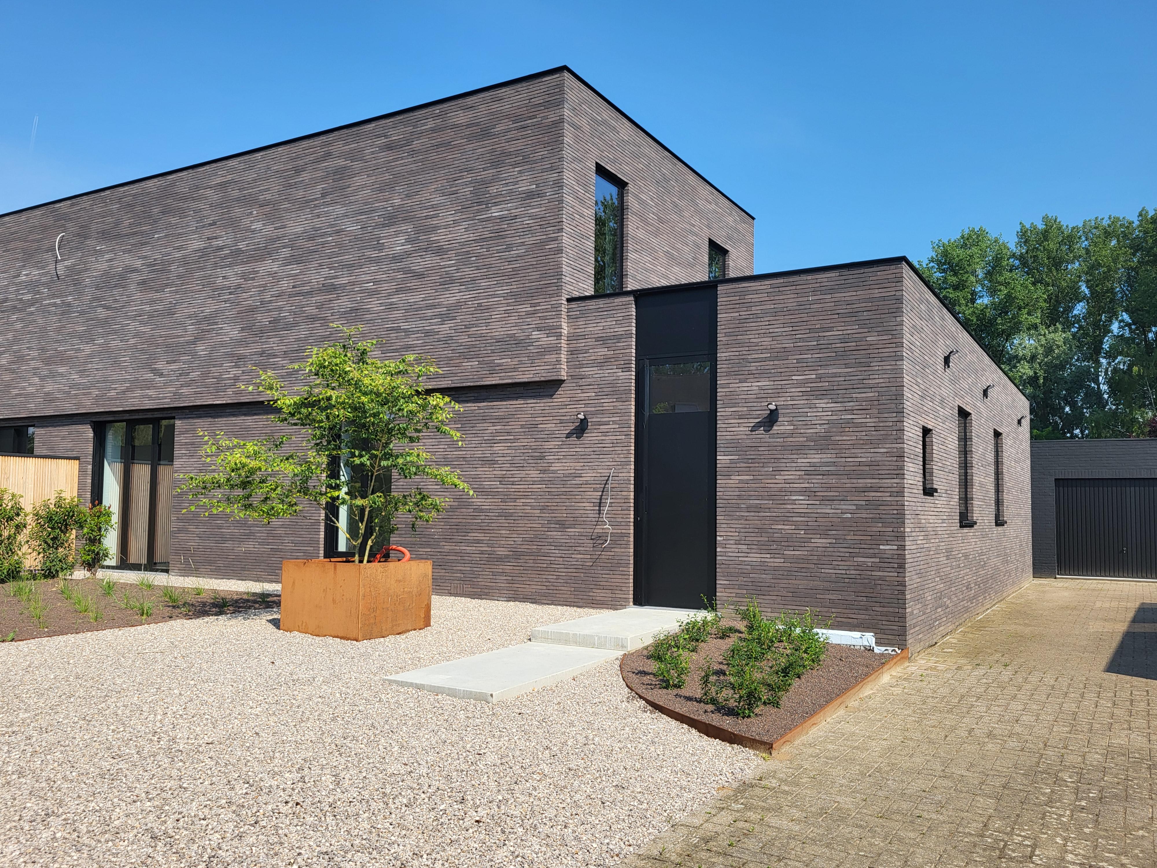 Prachtige moderne woning met bewoonbare oppervlakte van 166m² op 1209m² met zonnige tuin en garage.  foto 3