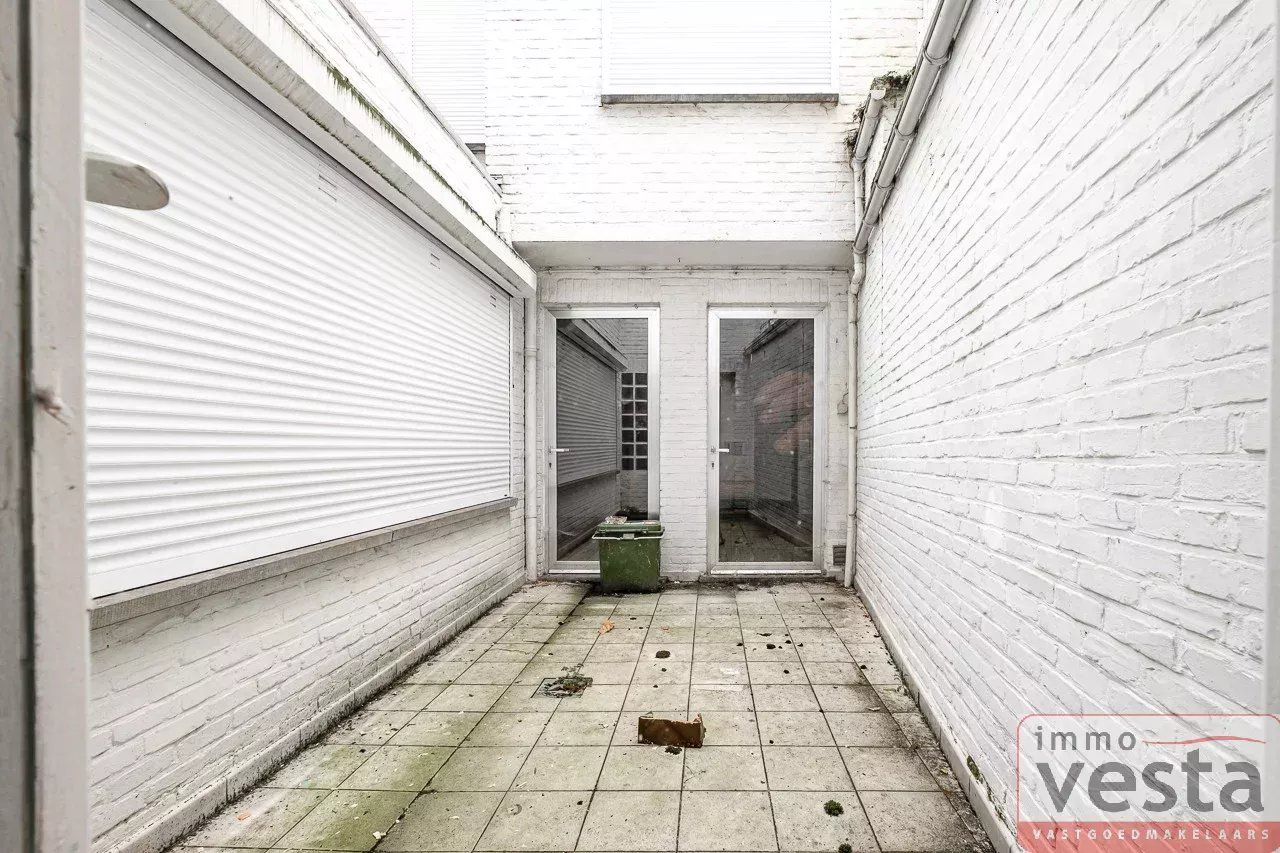 Te renoveren handelsruimte met woonst op toplocatie foto 8